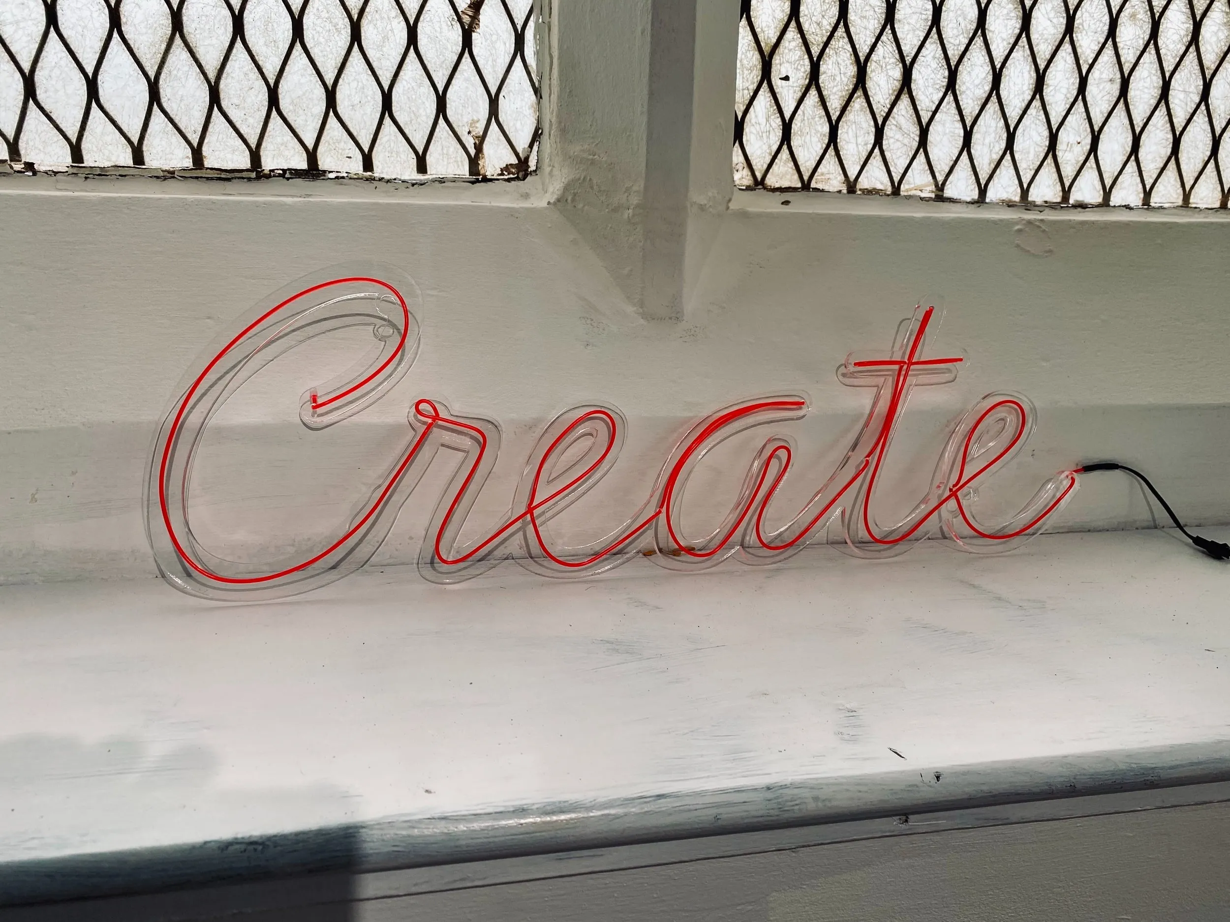 "Create" in cursive
