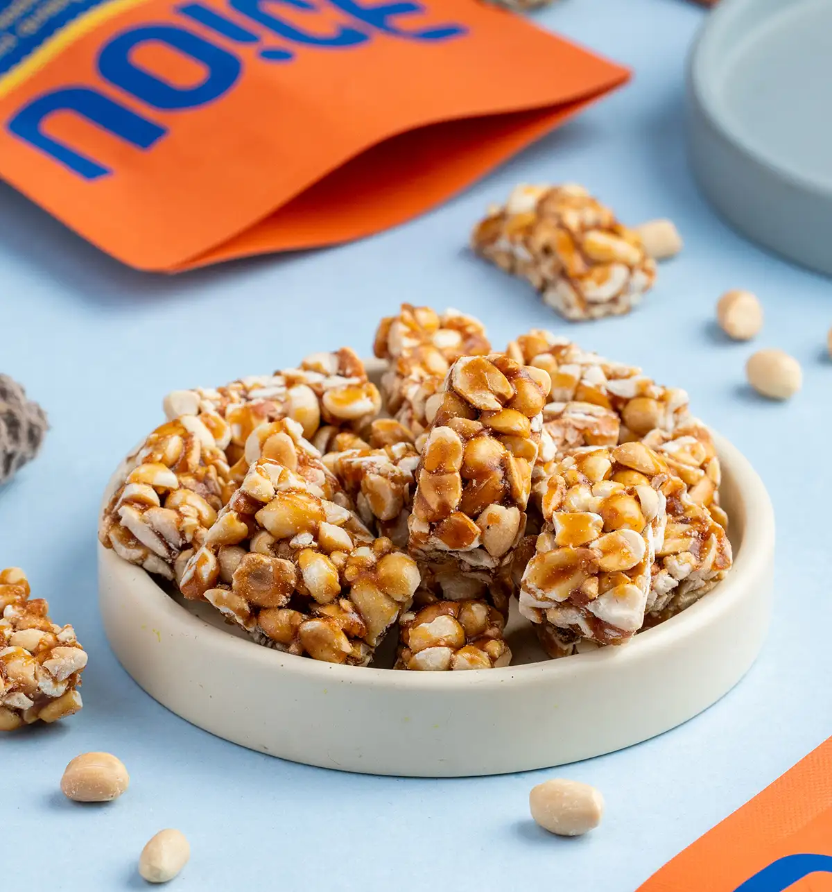 NOICE Jaggery Peanut Chikki, handmade with roasted peanuts and melted golden jaggery with zero preservatives or refined sugar