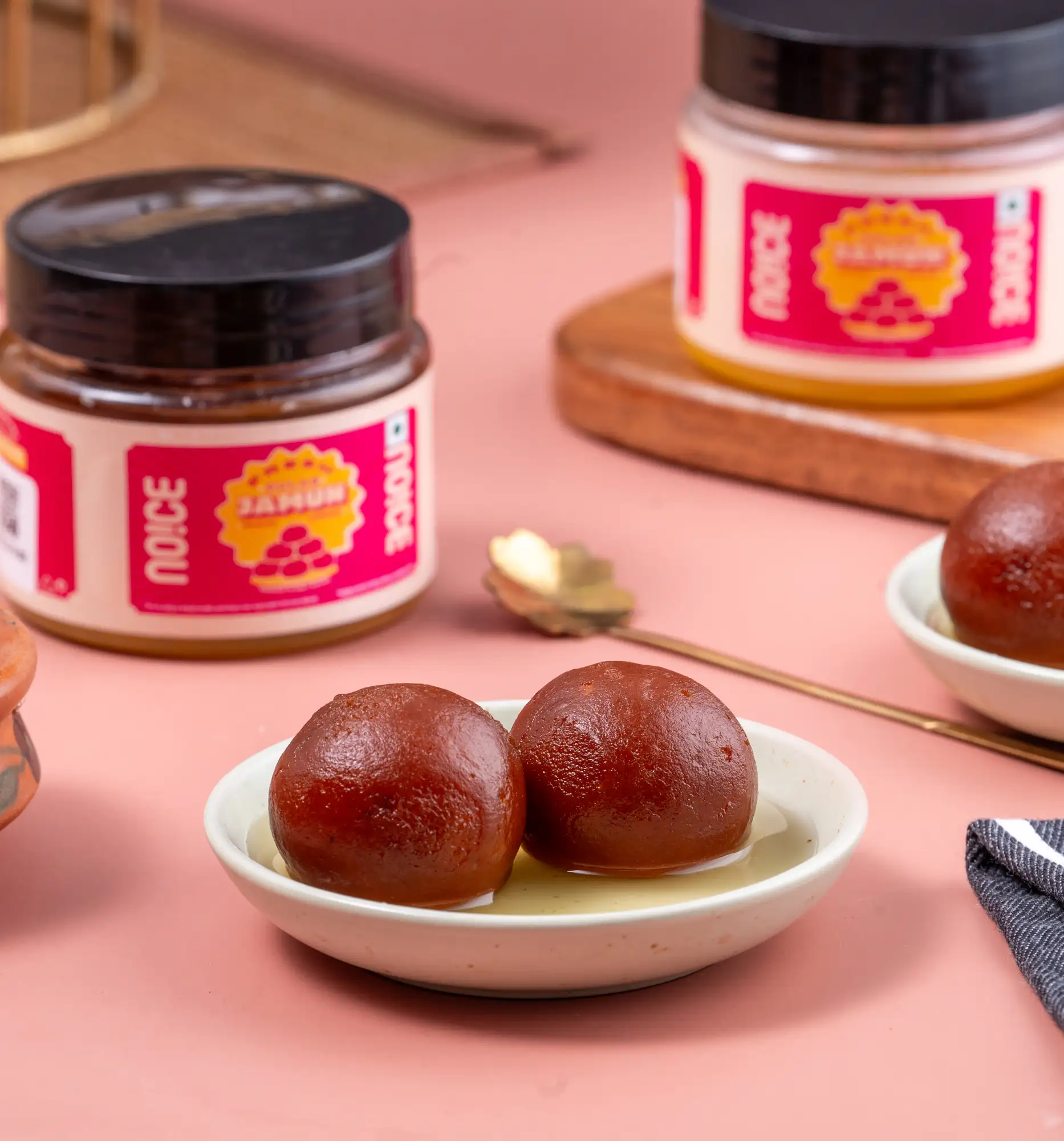 NOICE Fresh Gulab Jamun, soft and spongy traditional sweet treats stuffed with pistachios and elaichi, cooked in rich desi ghee without preservatives.