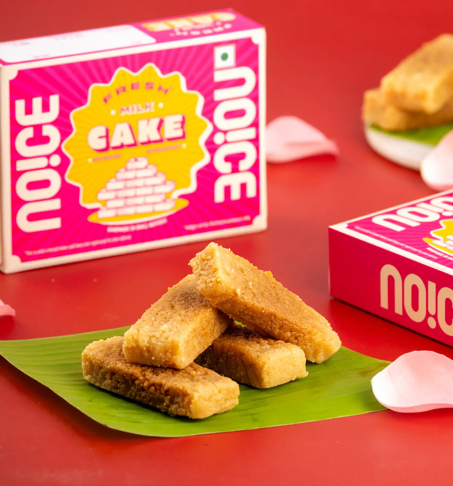 NOICE Milk Cake, a golden and grainy caramelized milk sweet topped with almonds and made with pure desi ghee