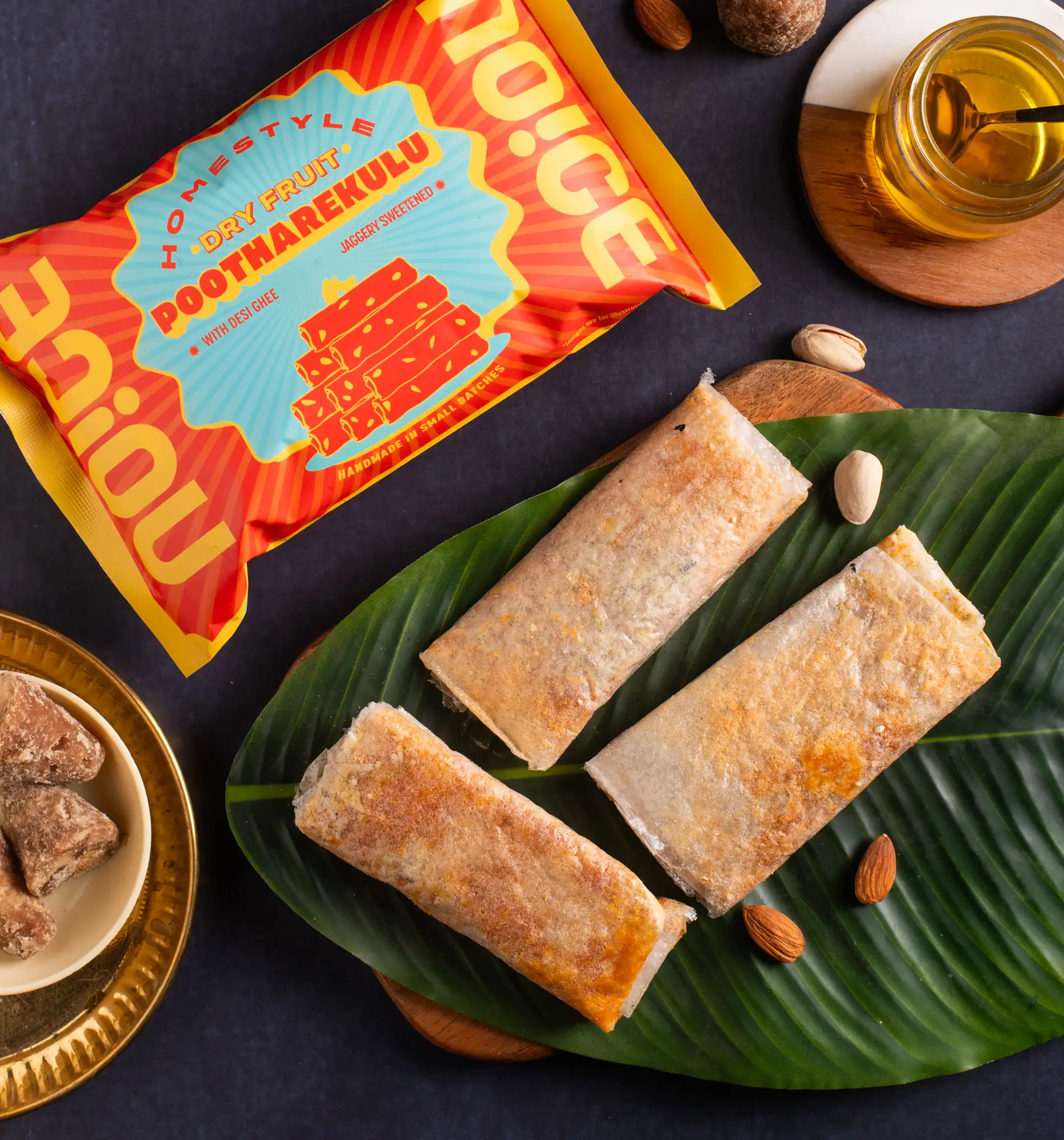 NOICE Homestyle Dryfruit Pootharekulu, paper-thin layers of traditional sweet wrapped with cashews, pistachios, almonds, pure desi ghee, and jaggery