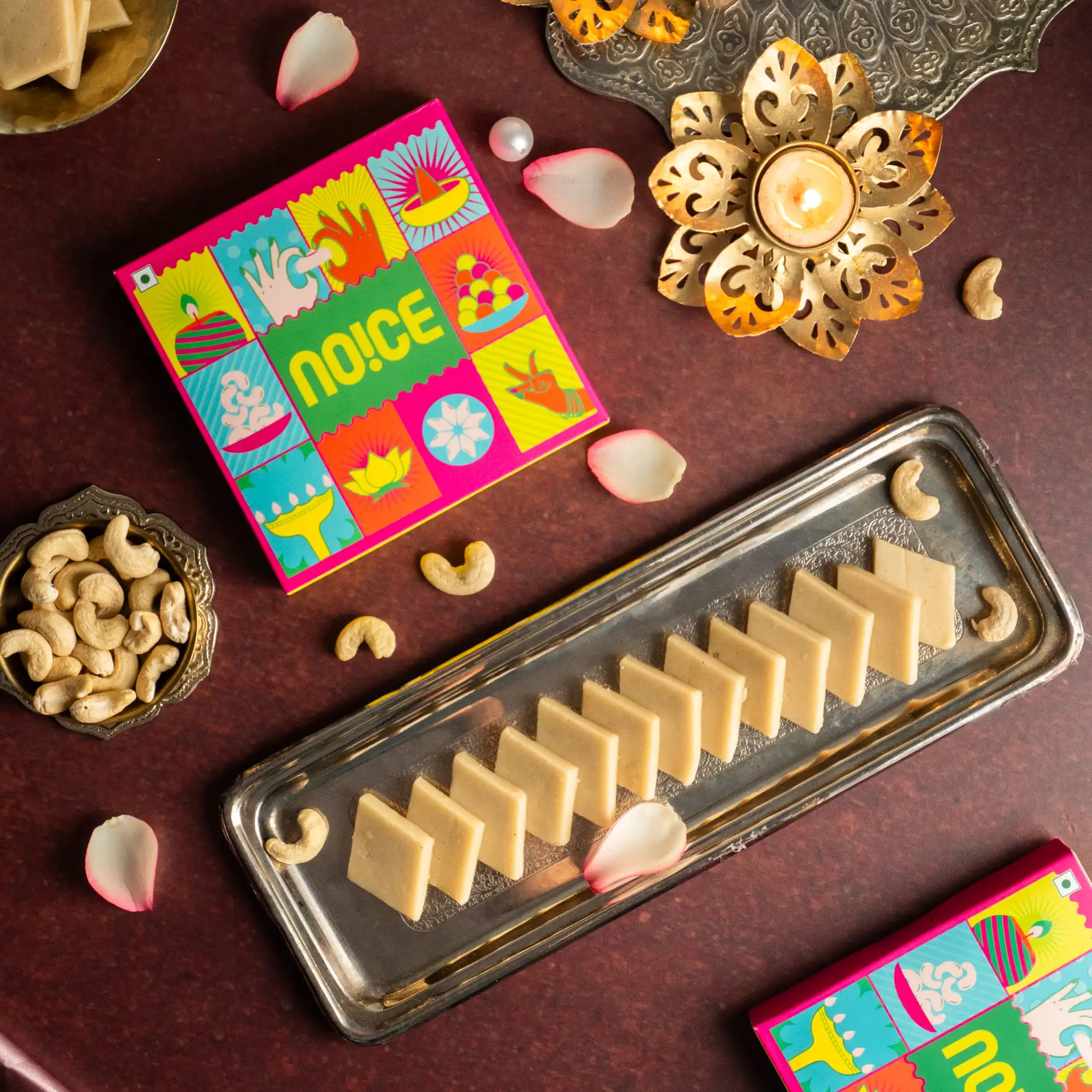 NOICE Kaju Katli 175g Sweet Gift Box, smooth diamond-cut kaju barfi handcrafted with premium grade cashews and pure desi ghee with no added preservatives.