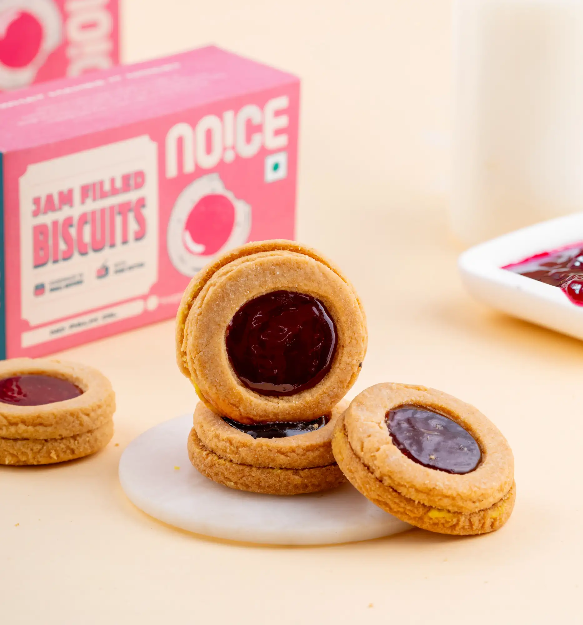NOICE jam filled biscuits with a real fruit pulp center and buttery shell, baked with zero palm oil.