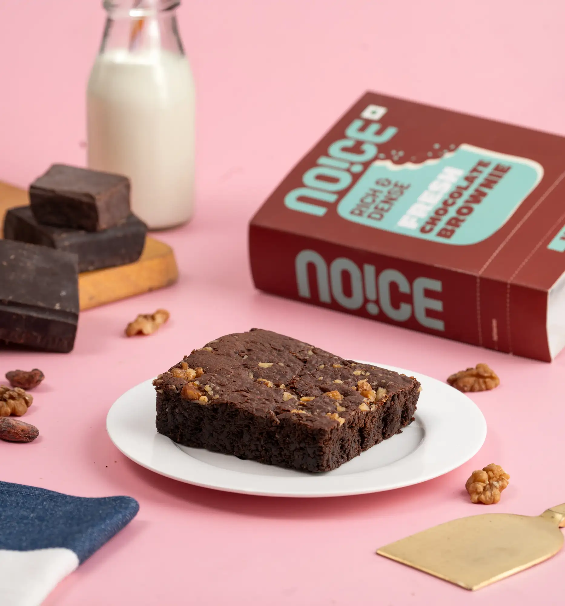 NOICE fresh chocolate brownie cake, fudgy and dense, baked with walnuts and zero palm oil.