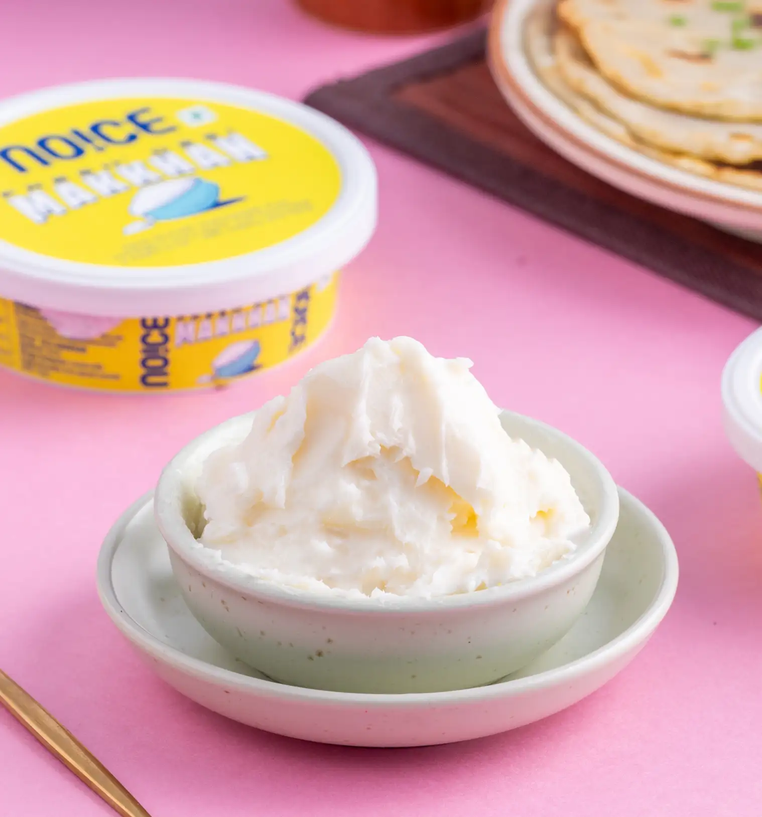 NOICE fresh white butter, traditionally hand-churned in small batches with a soft and creamy texture.