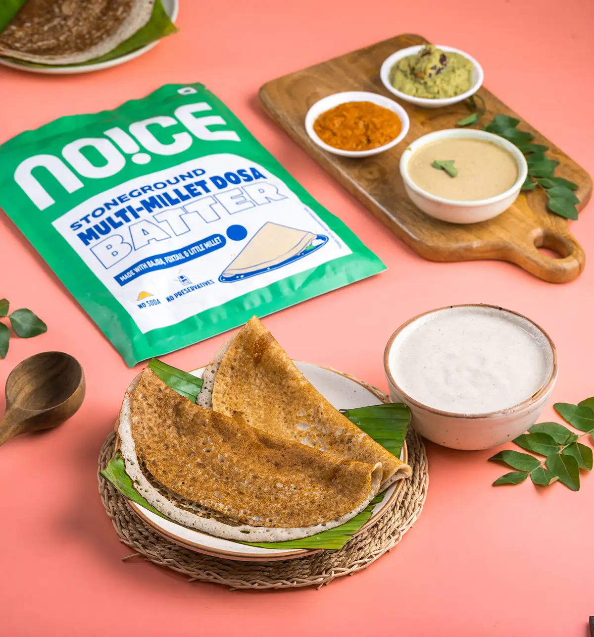 NOICE stone-ground multi-millet dosa batter naturally fermented with foxtail, pearl, and little millet, featuring no preservatives.