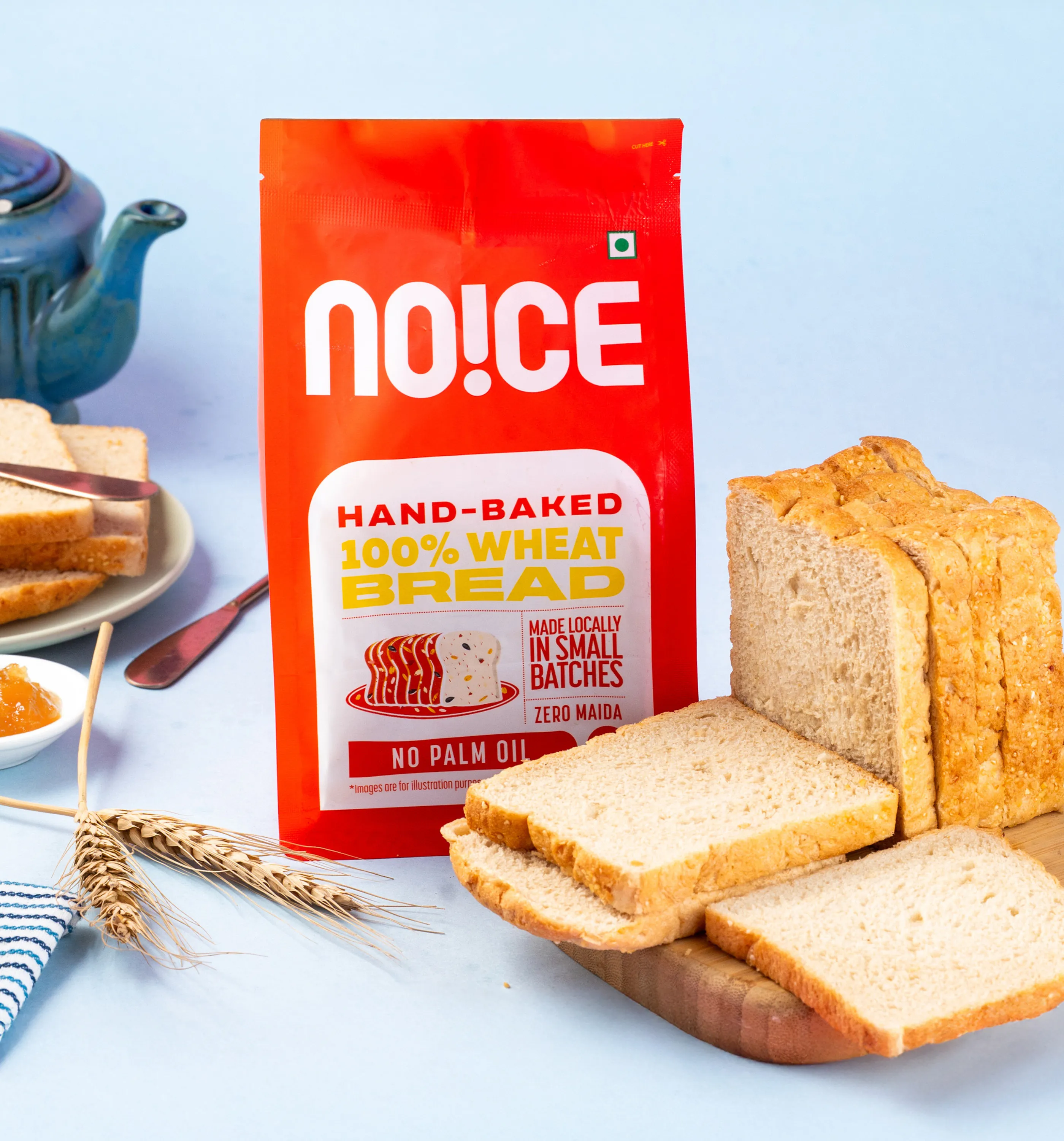 NOICE handcrafted whole wheat bread made with zero maida and real butter, featuring a soft and fluffy texture.