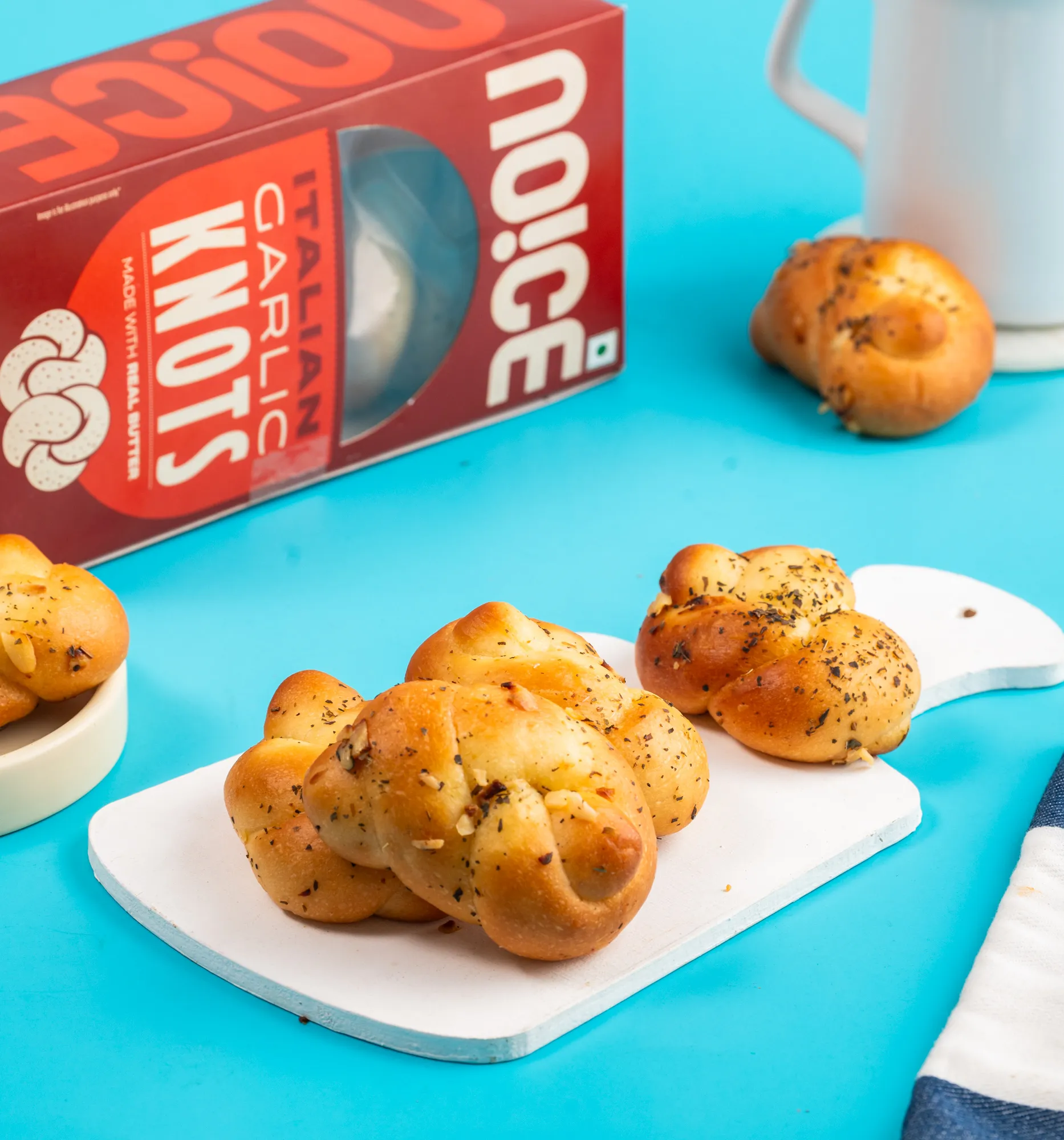 NOICE freshly made Italian garlic knots baked with real butter and loaded with garlic.