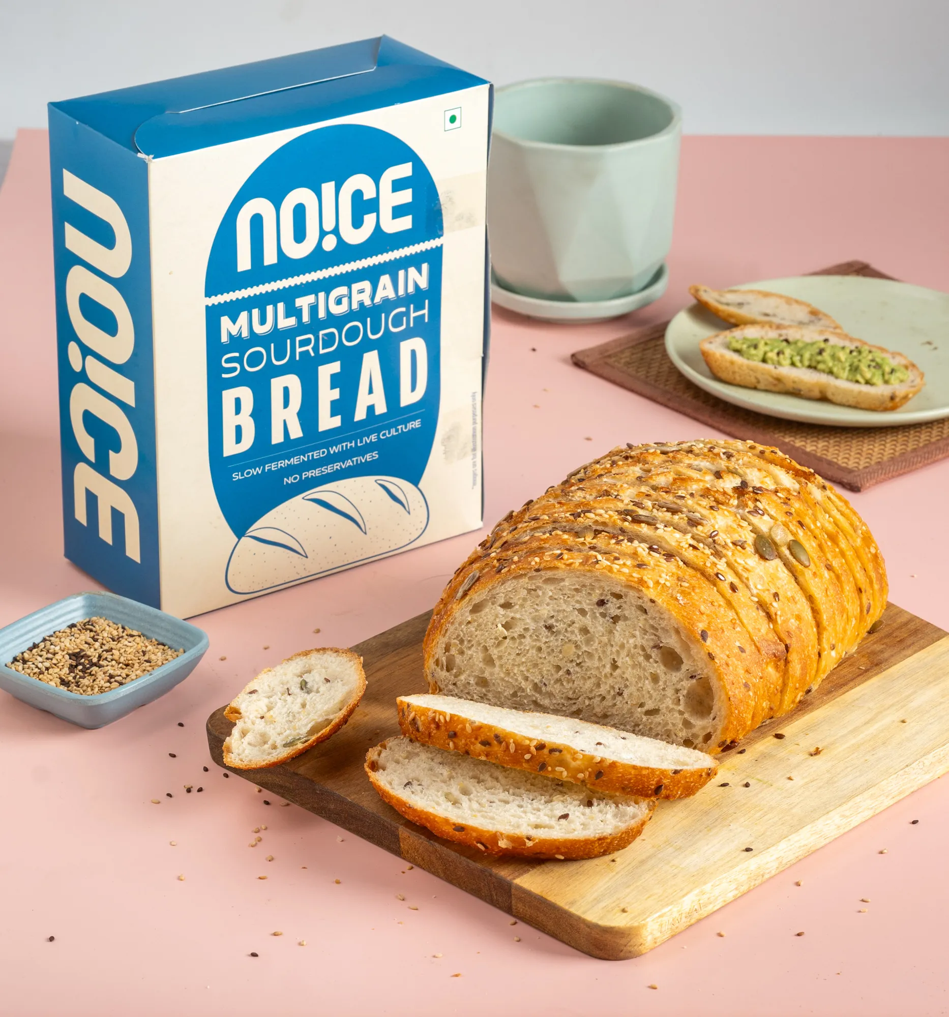 NOICE Multigrain Sourdough Bread handcrafted with live cultures and a mix of six seeds, featuring a soft crumb and nutty crust