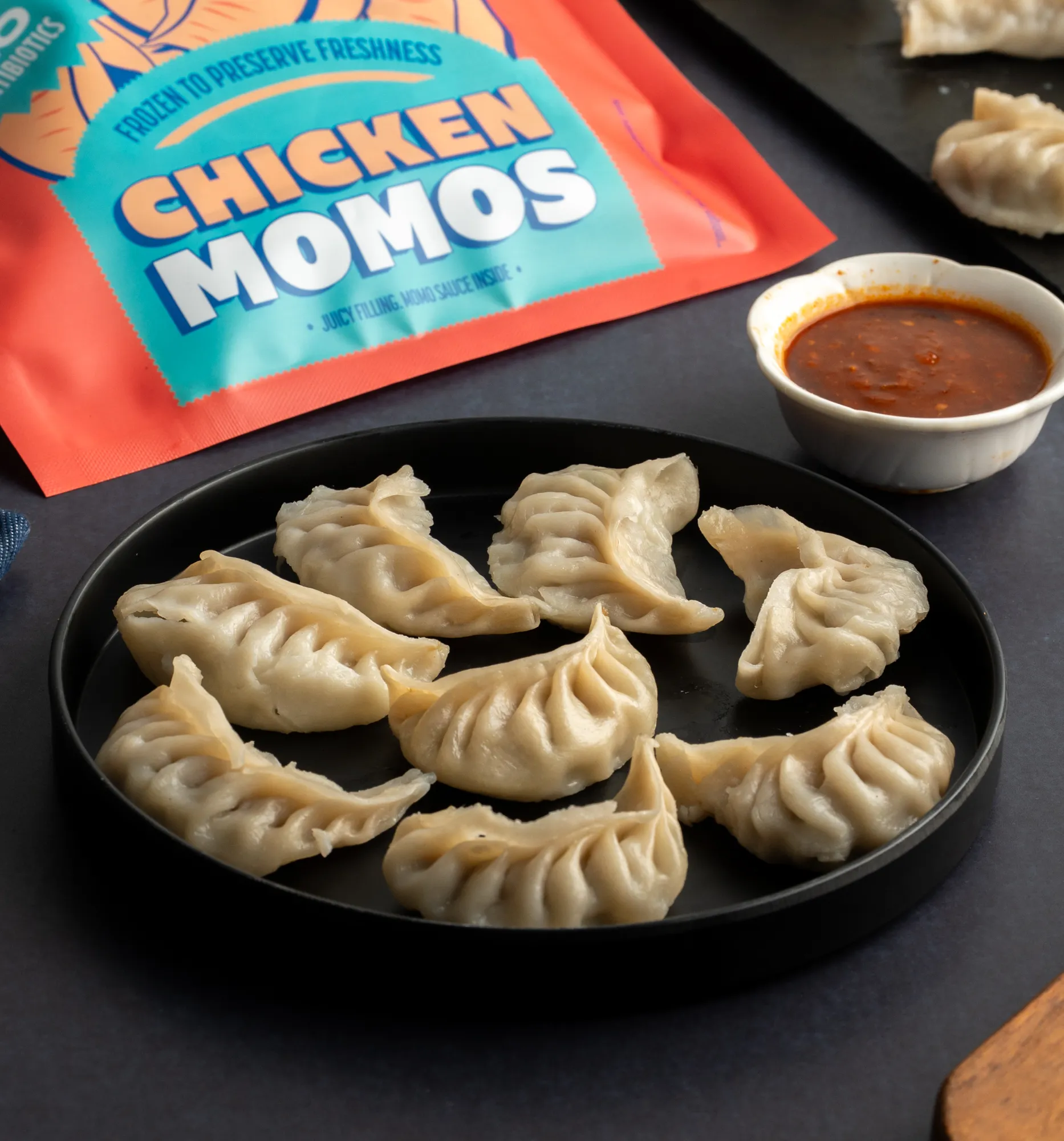 NOICE chicken momos juicy soft dumplings with sauce frozen ready to cook