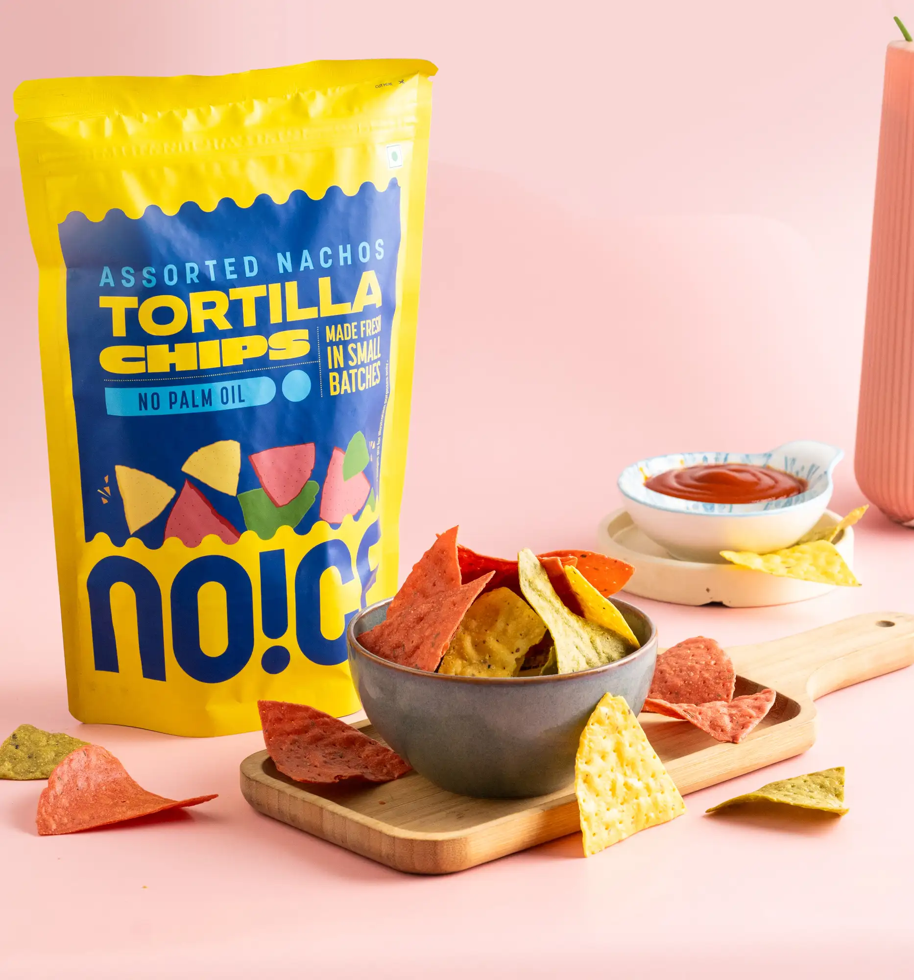 NOICE Assorted Nachos Tortilla Chips, tri-coloured chips made from spinach, beetroot, and corn, crafted in small batches with zero palm oil and zero junk.