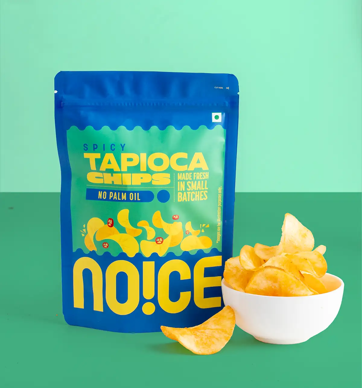 NOICE Spicy Tapioca Chips, thin and crispy cassava slices seasoned with a fiery spice blend and handcrafted in fresh coconut oil