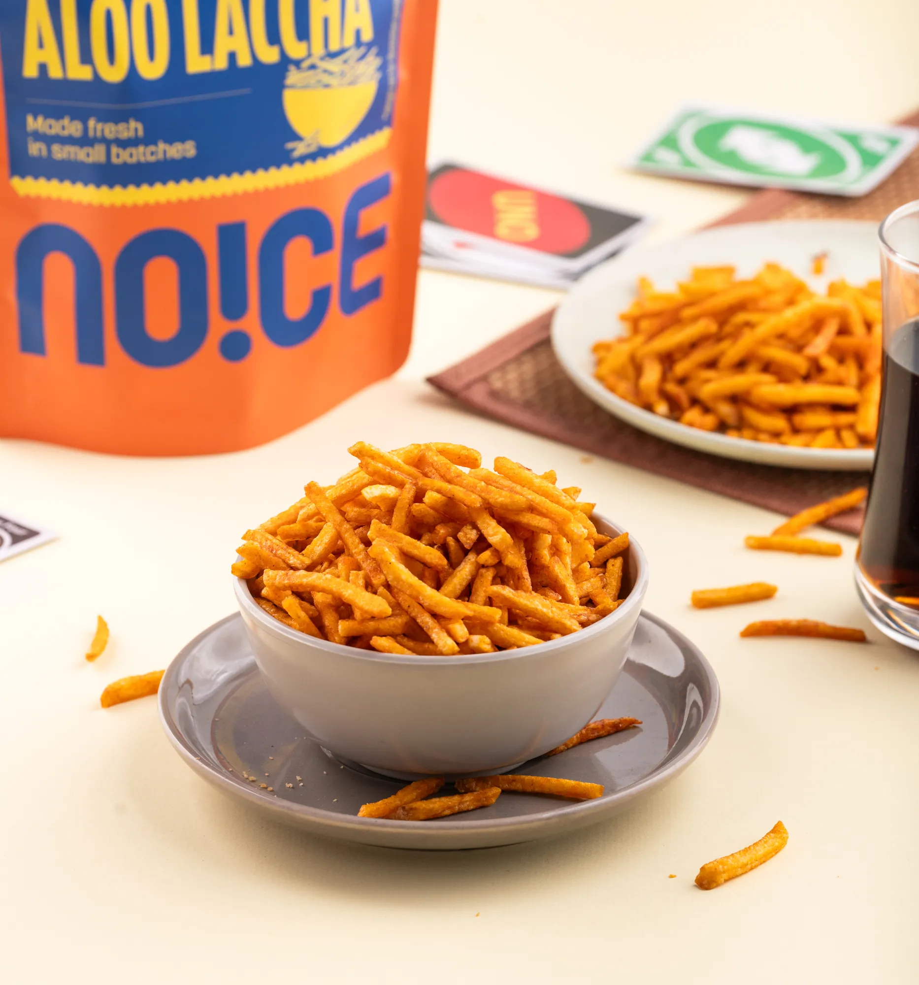 NOICE Aloo ke lacche, golden crispy potato sticks made with fresh rice bran oil and seasoned to perfection