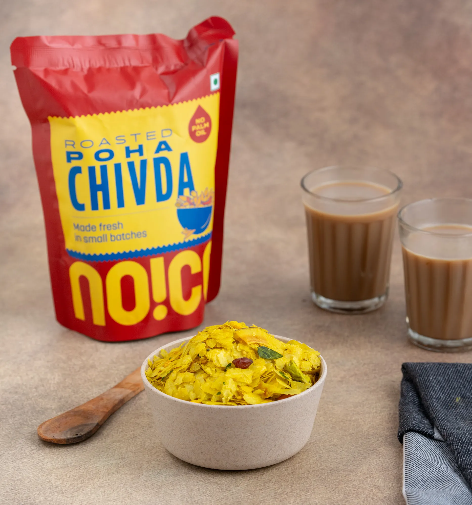Roasted Poha Chivda, a light and crunchy mix of roasted flattened rice, peanuts, and aromatic curry leaves, made without palm oil or artificial additives.