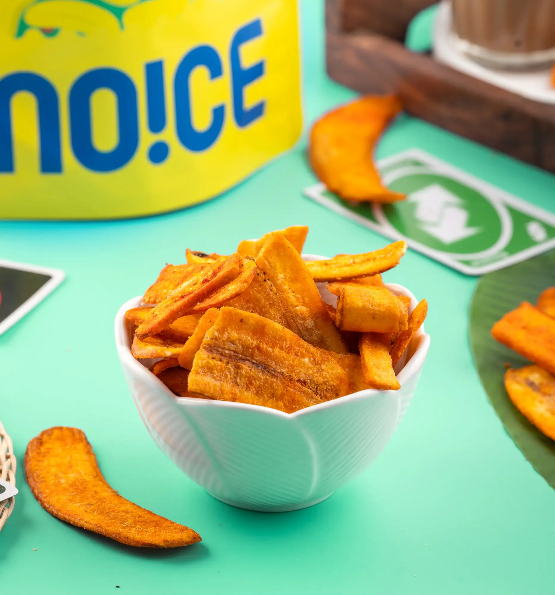 NOICE Spicy Masala Long Banana Chips, extra-long and crunchy banana slices seasoned with spicy masala, crafted in small batches with fresh coconut oil.
