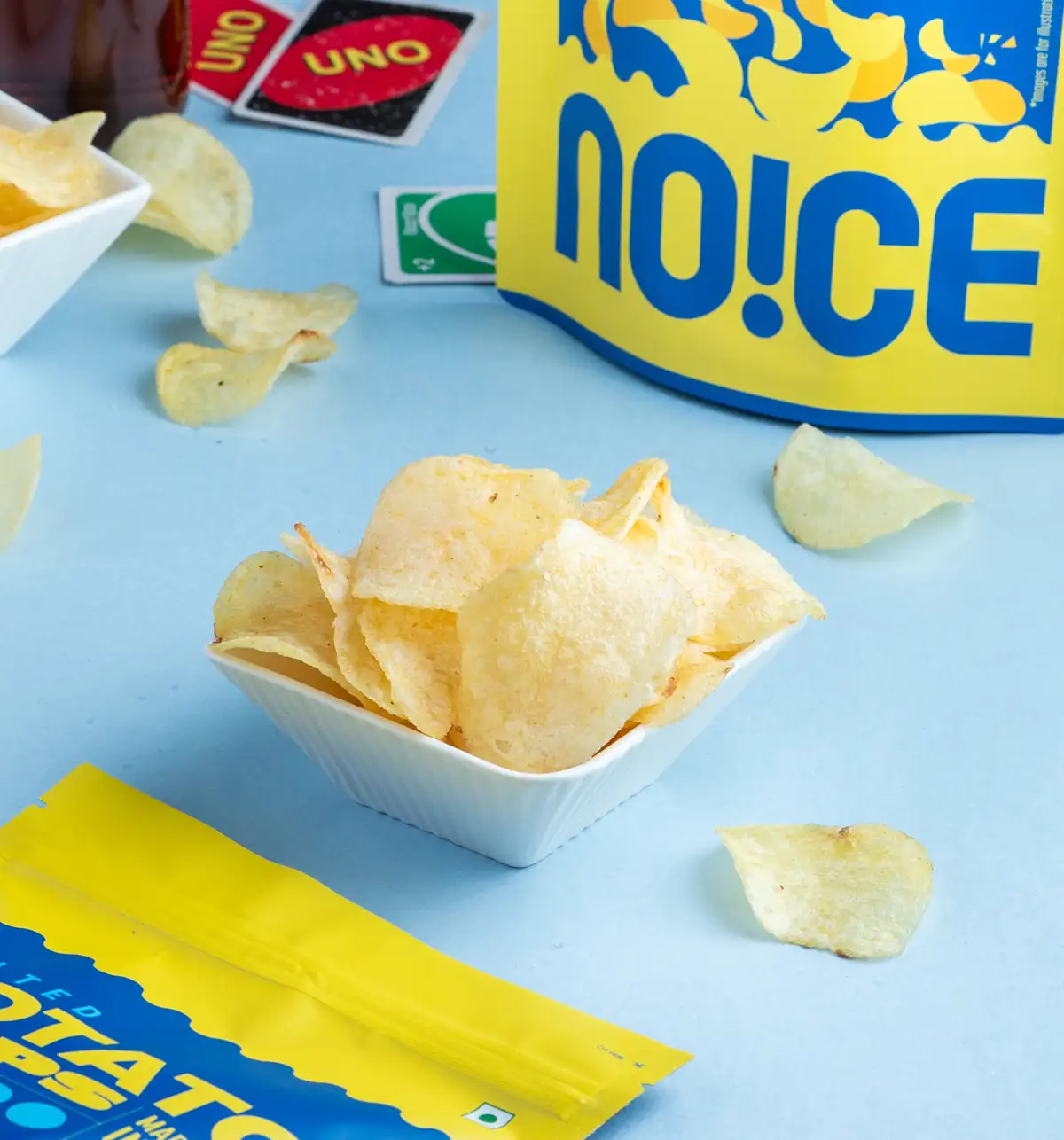 NOICE Salted Potato Hot Chips 100g, crispy and golden homestyle wafer snacks seasoned with sea salt and fried in fresh, non-reused sunflower oil.