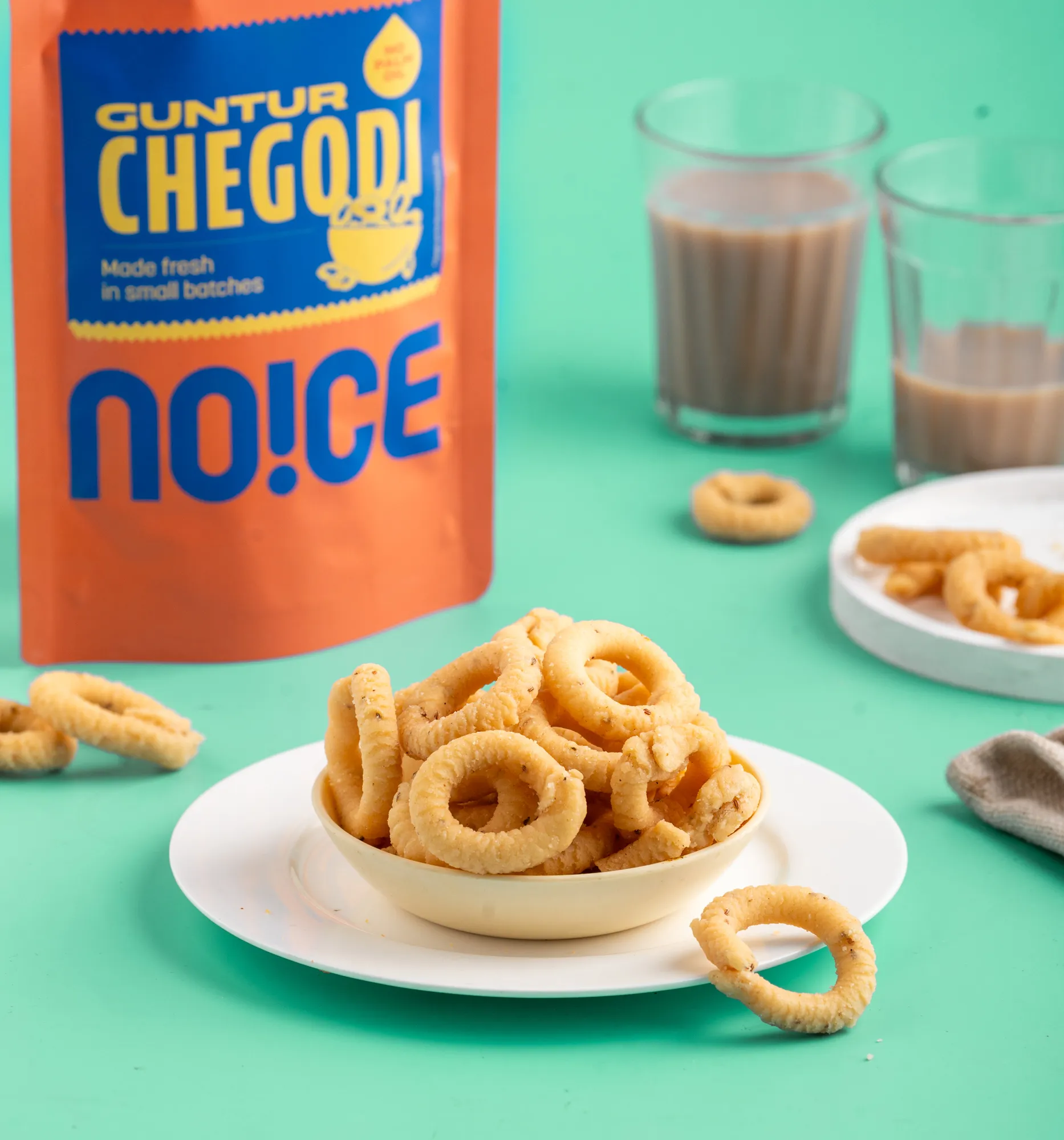 NOICE Homestyle Chegodi, golden and crispy ring-shaped savory snacks from Andhra, handcrafted in small batches using fresh rice oil without palm oil or preservatives