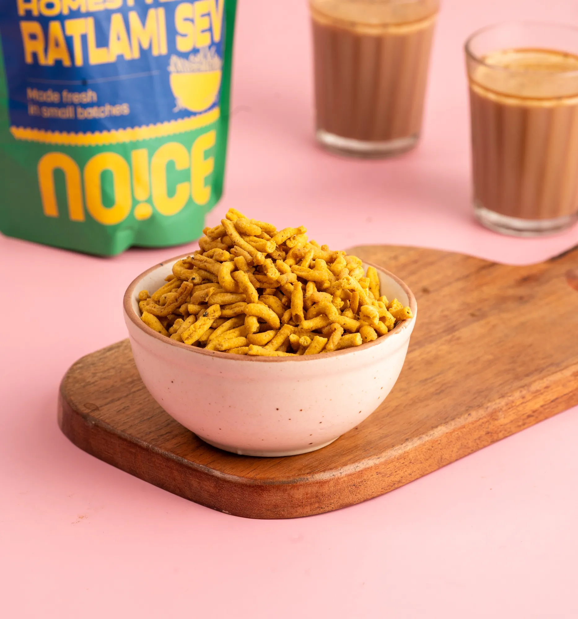 NOICE Ratlami Sev, thick and spicy golden chickpea flour threads seasoned with cloves and black pepper, made using fresh groundnut oil