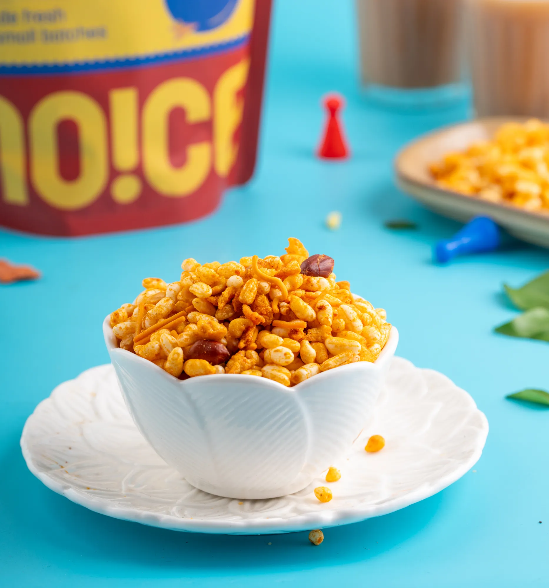 NOICE Bhadang Bhel, a spicy and crunchy Maharashtrian snack mix featuring puffed rice seasoned with garlic, peanuts, and red chili, made without palm oil.