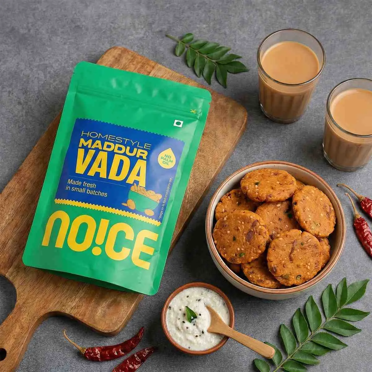 NOICE Homestyle Maddur Vada, crispy and golden-brown savory fritters made with onions and semolina, handcrafted without palm oil or artificial additives