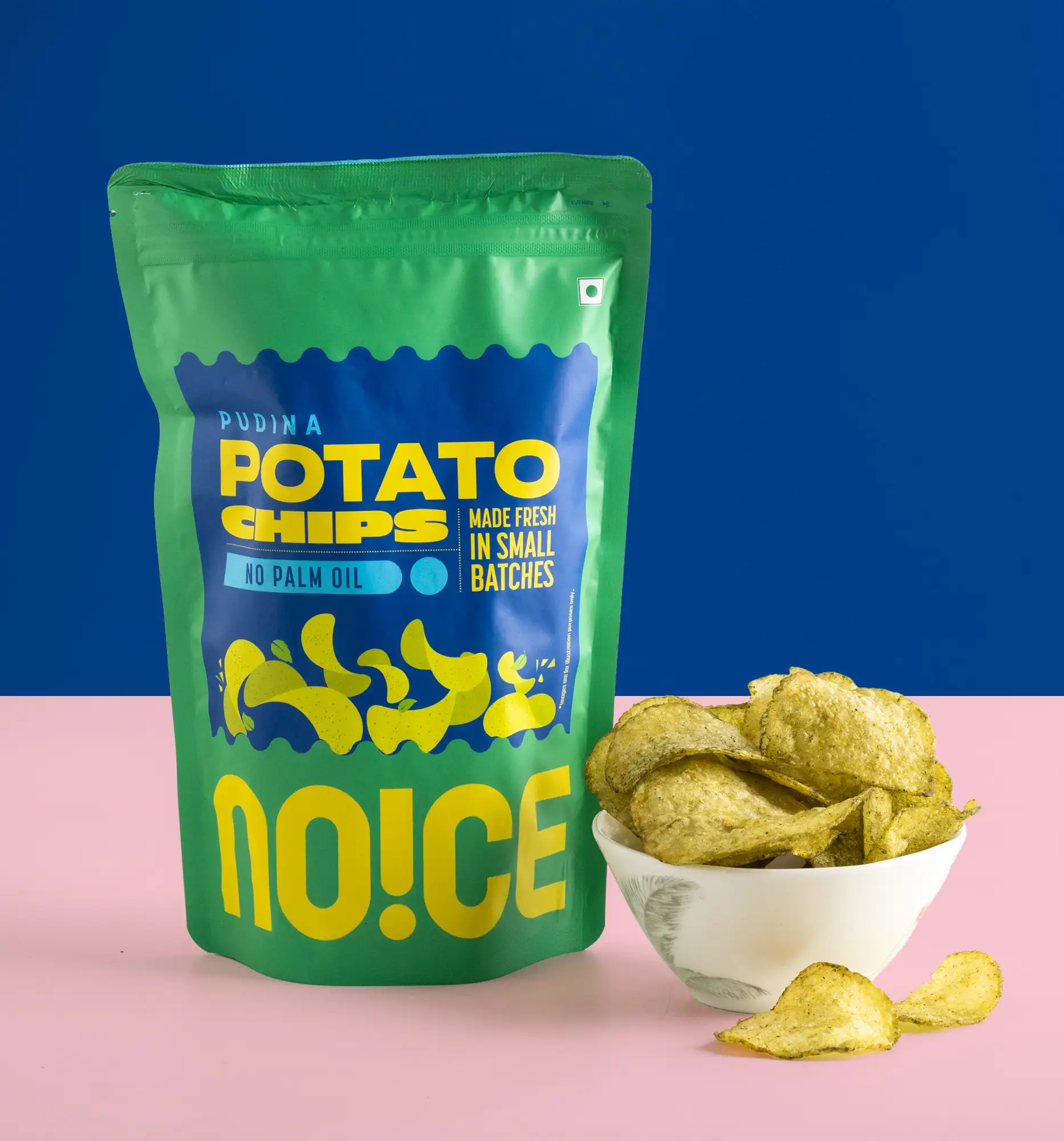 NOICE Pudina Potato Chips, thin and crispy potato slices seasoned with a cool green mint and spice blend, made without palm oil or preservatives.