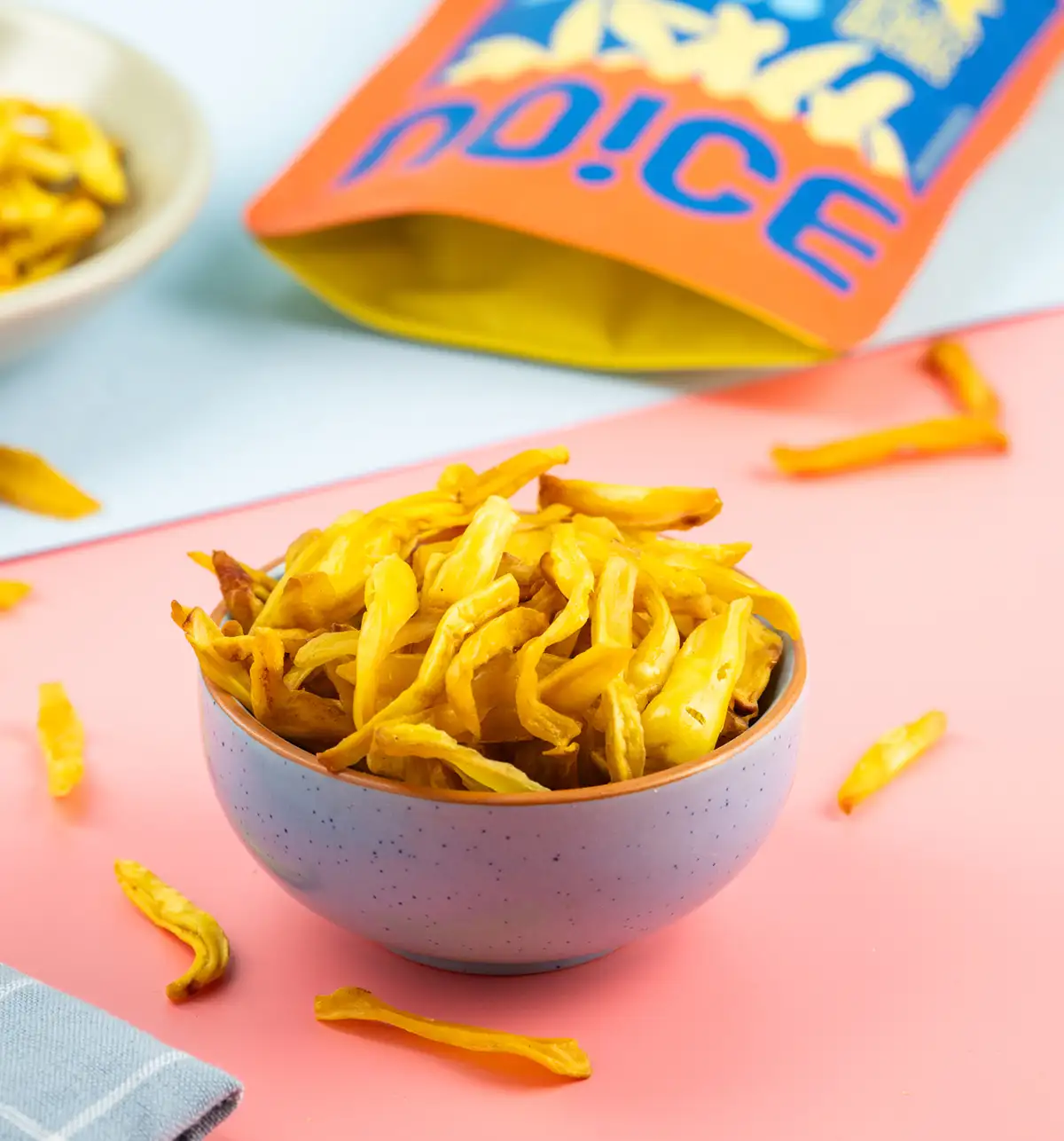 NOICE Jackfruit Stick Chips, crispy golden Kerala-style jackfruit slices handcrafted in fresh coconut oil and lightly salted