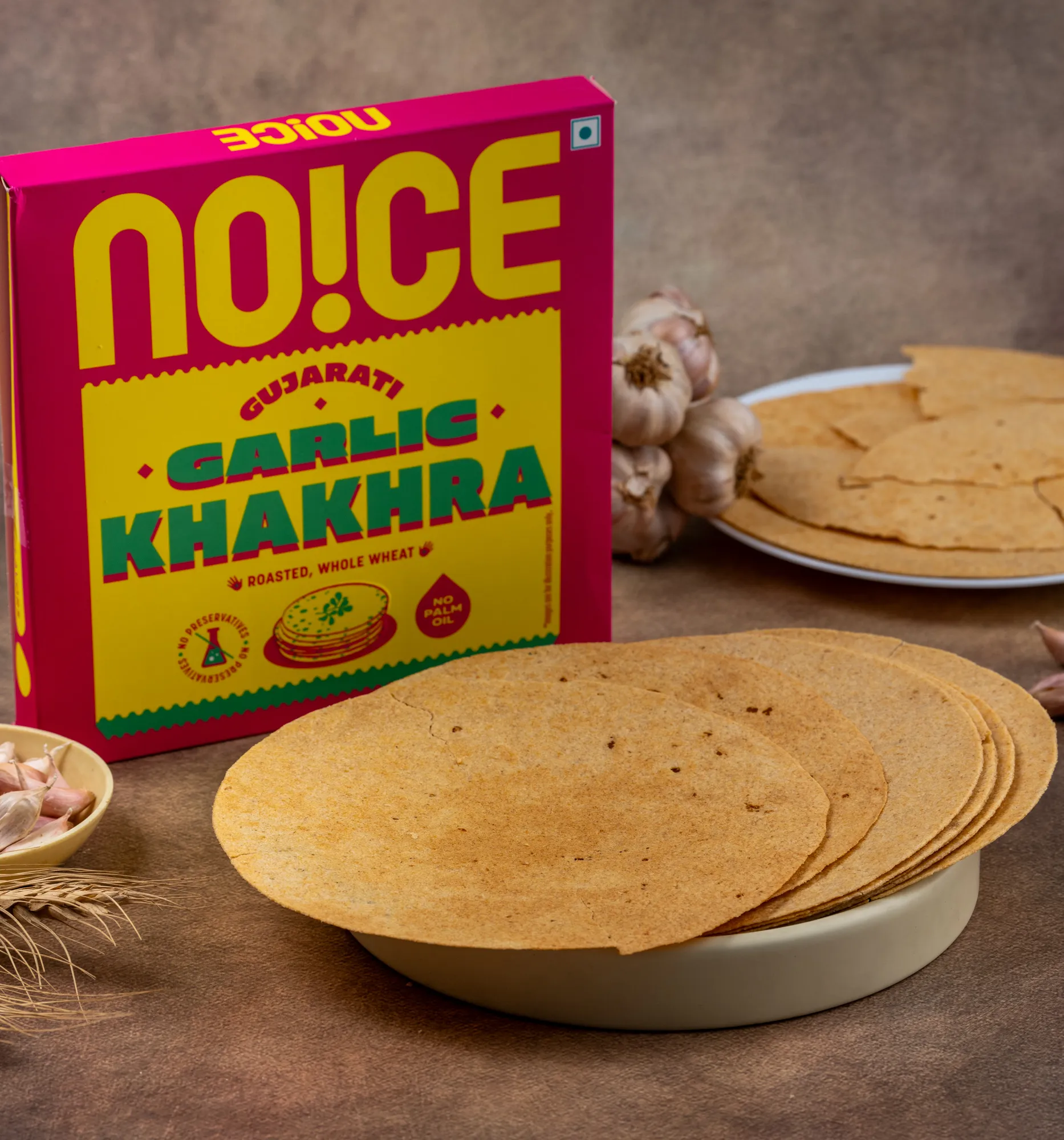 NOICE Gujarati Garlic Khakhra, thin and crispy whole wheat flatbread infused with bold garlic and spices, slow-roasted without palm oil or preservatives
