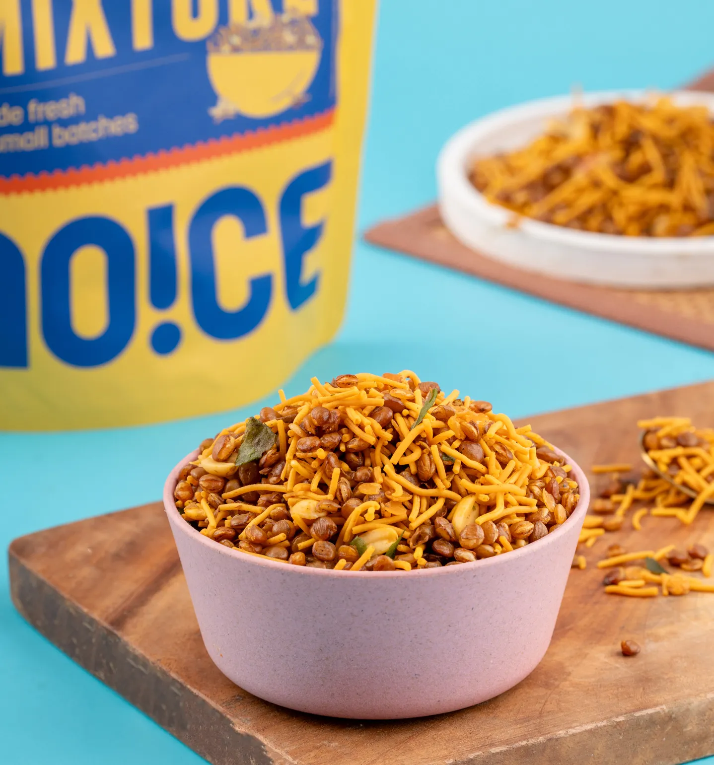 NOICE Homestyle Bombay Mixture, a crunchy blend of spicy sev, roasted nuts, and savory bites, handcrafted in small batches without palm oil or preservatives