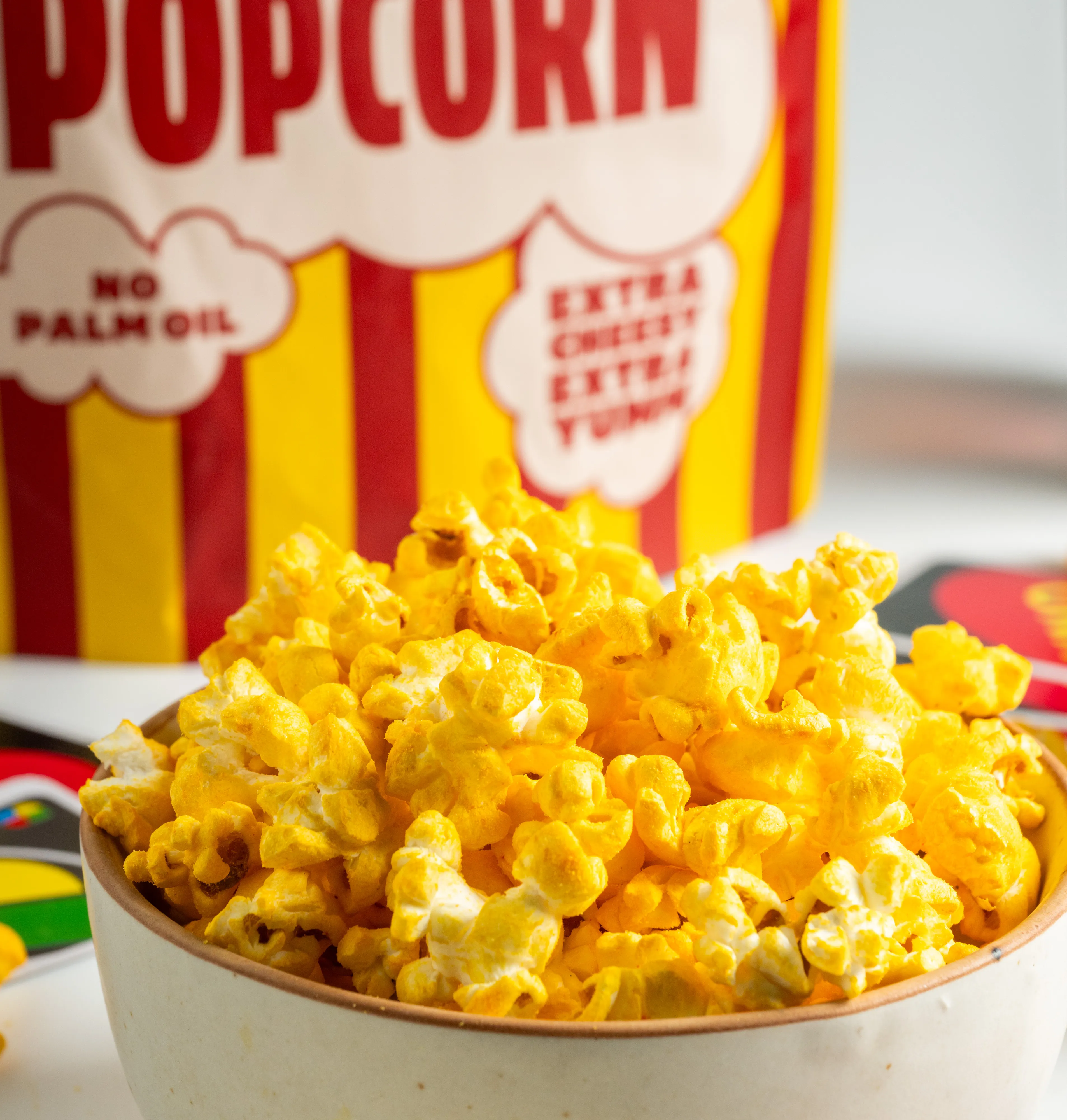 NOICE Cheddar Cheese Popcorn made with real cheddar powder, no palm oil and no preservatives in a crunchy ready to eat snack.