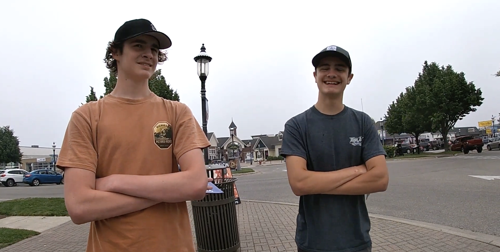 Two students in conversation about abortion on a sidewalk