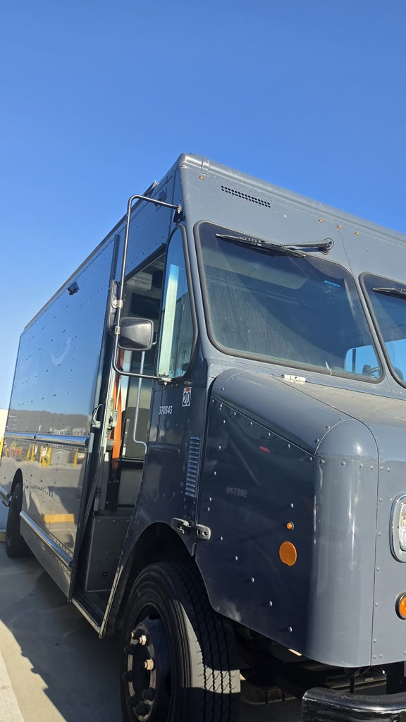 Fleet delivery vans in for collision repair at Spark Collision Center