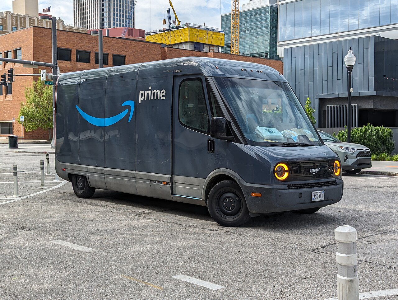 Amazon Rivian EDV-700 electric delivery van on a city street