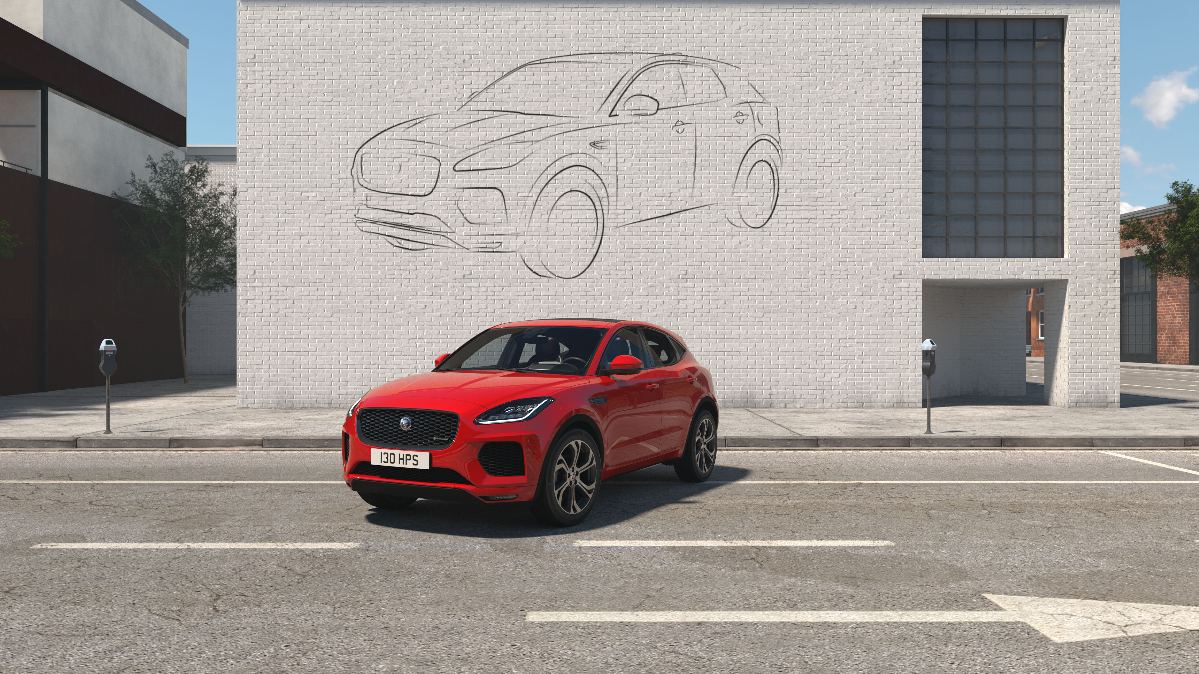 Red Jaguar SUV parked on an urban street with a car outline sketch on white brick wall behind it.