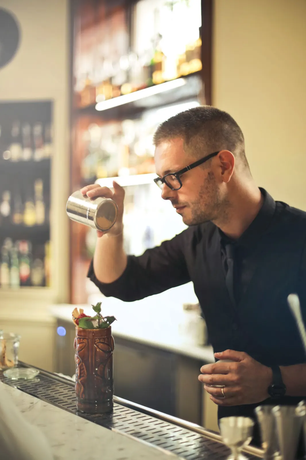 Bartender crafting a cocktail at the Gastro at 35 bar