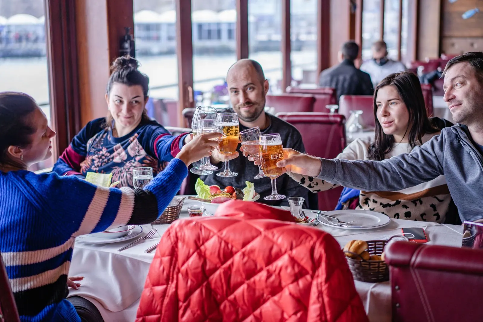 Guests toasting drinks together at Gastro at 35