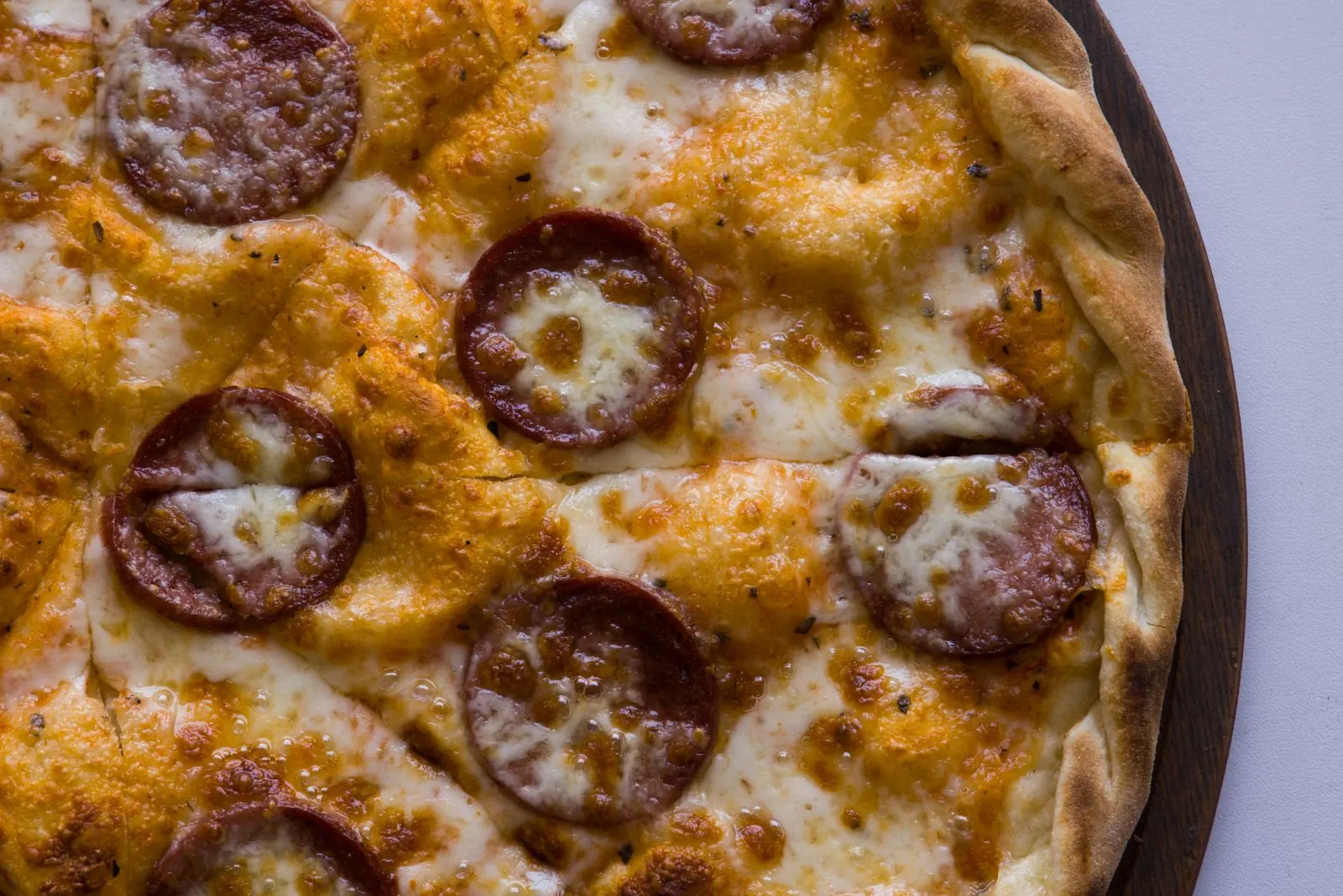Pepperoni pizza slice at Statue of Pizza