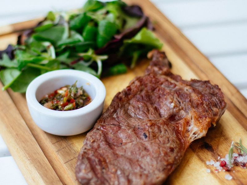 Grilled steak on a wooden board