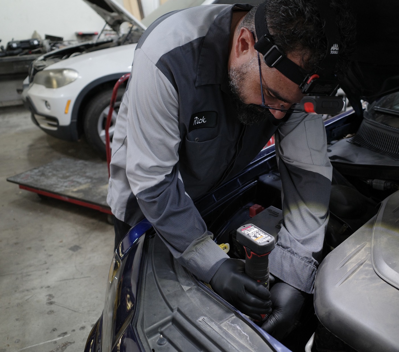Davis Automotive technician servicing a vehicle in the Dallas shop