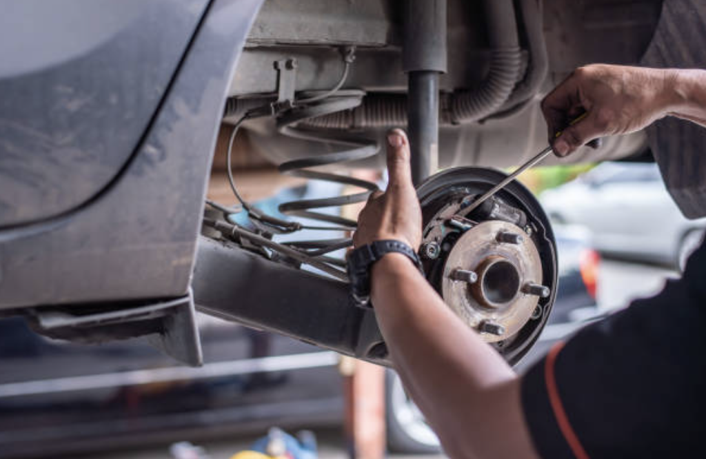 Brake rotor / caliper work at Davis Automotive in Dallas, Texas