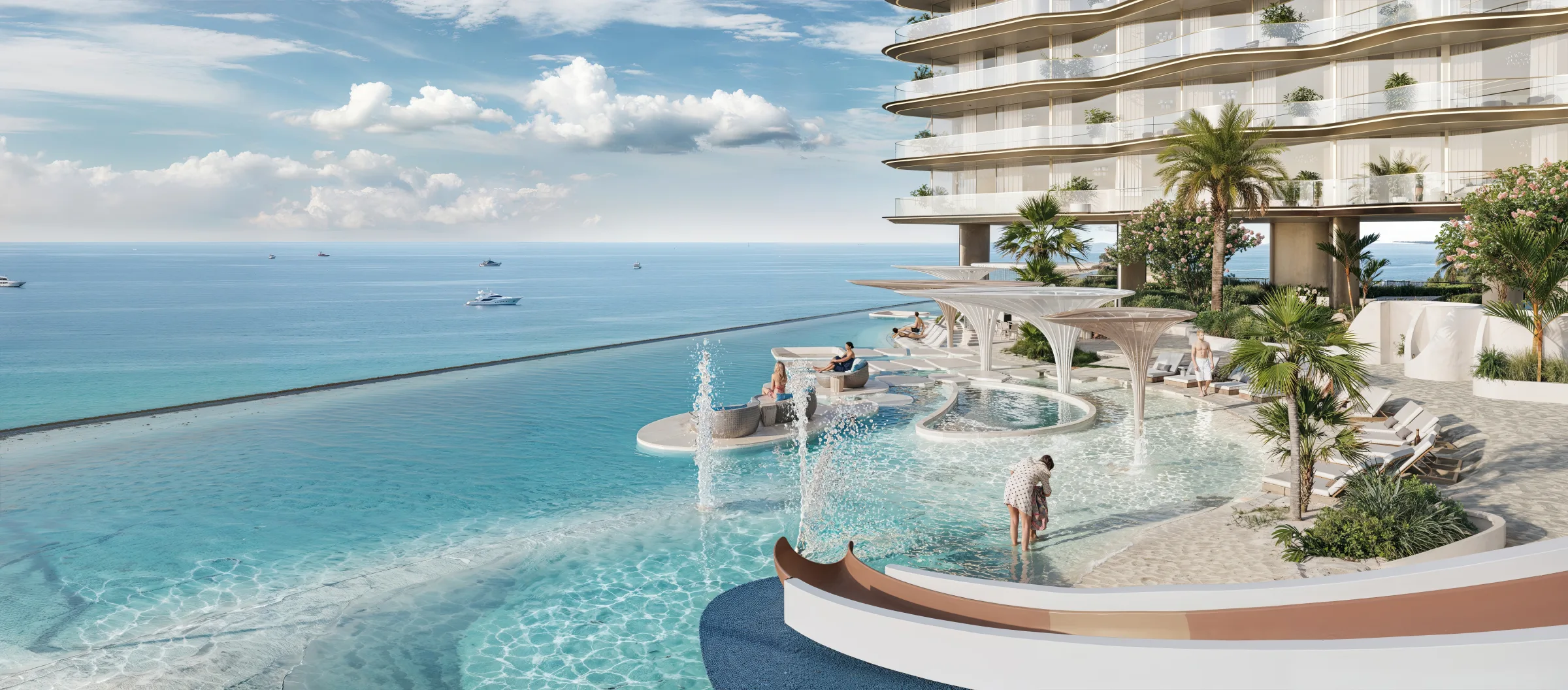 Waterfront pool and landscaped resort setting beside the sea