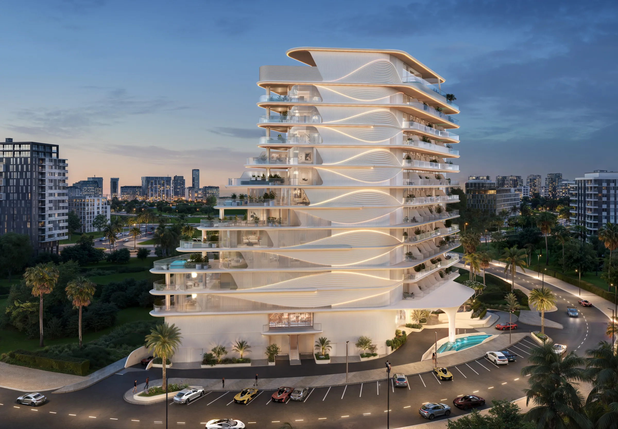 Sculptural white residential tower at blue hour