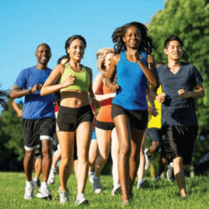 A group of people running together on a trail