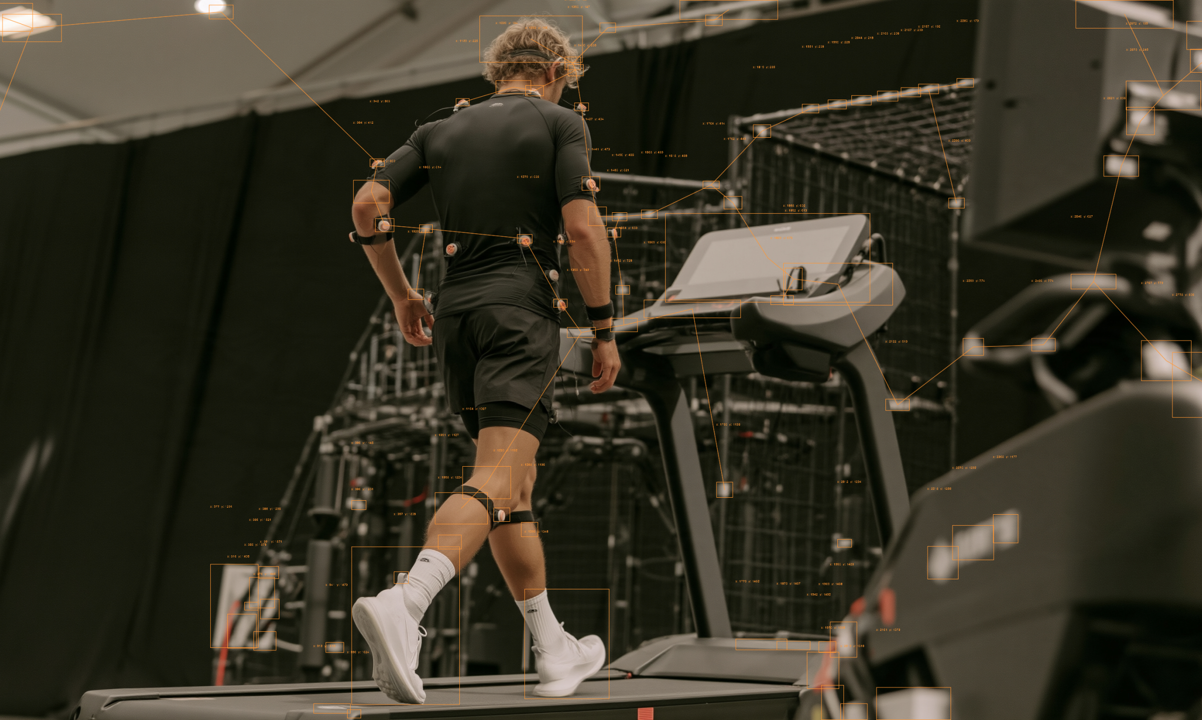 Athlete in an Xsens motion-capture suit walking on a treadmill in the Nicosia lab