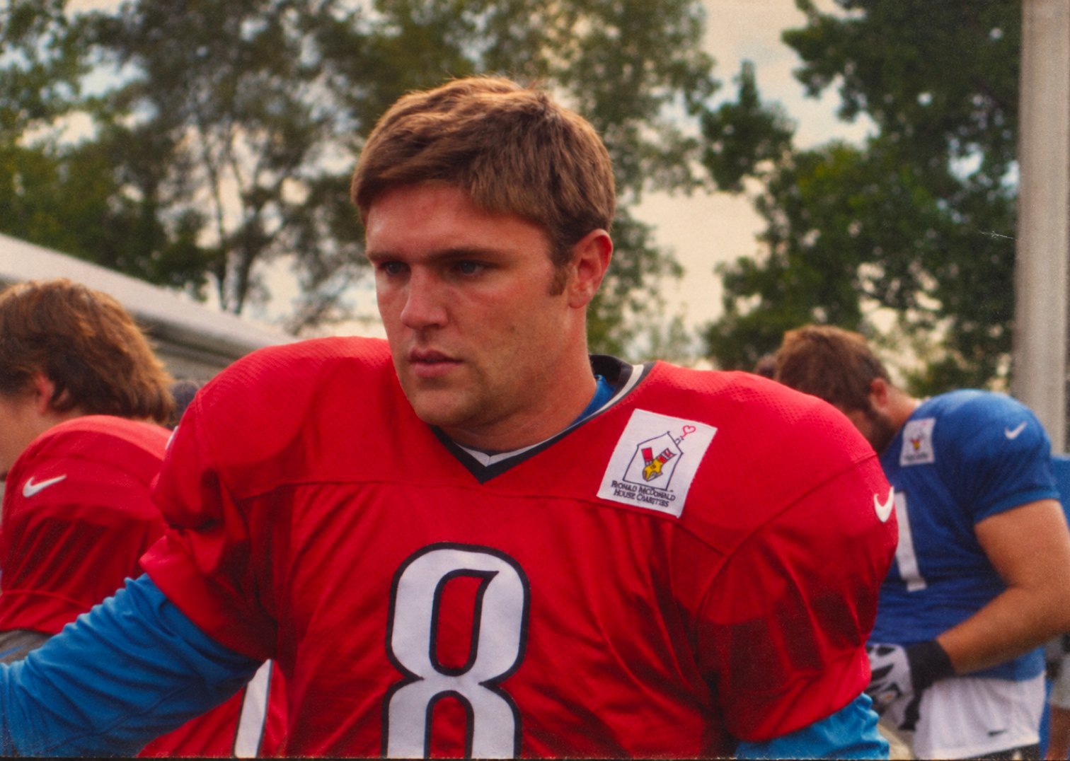 R.J. Archer at training camp in a red number 8 practice jersey