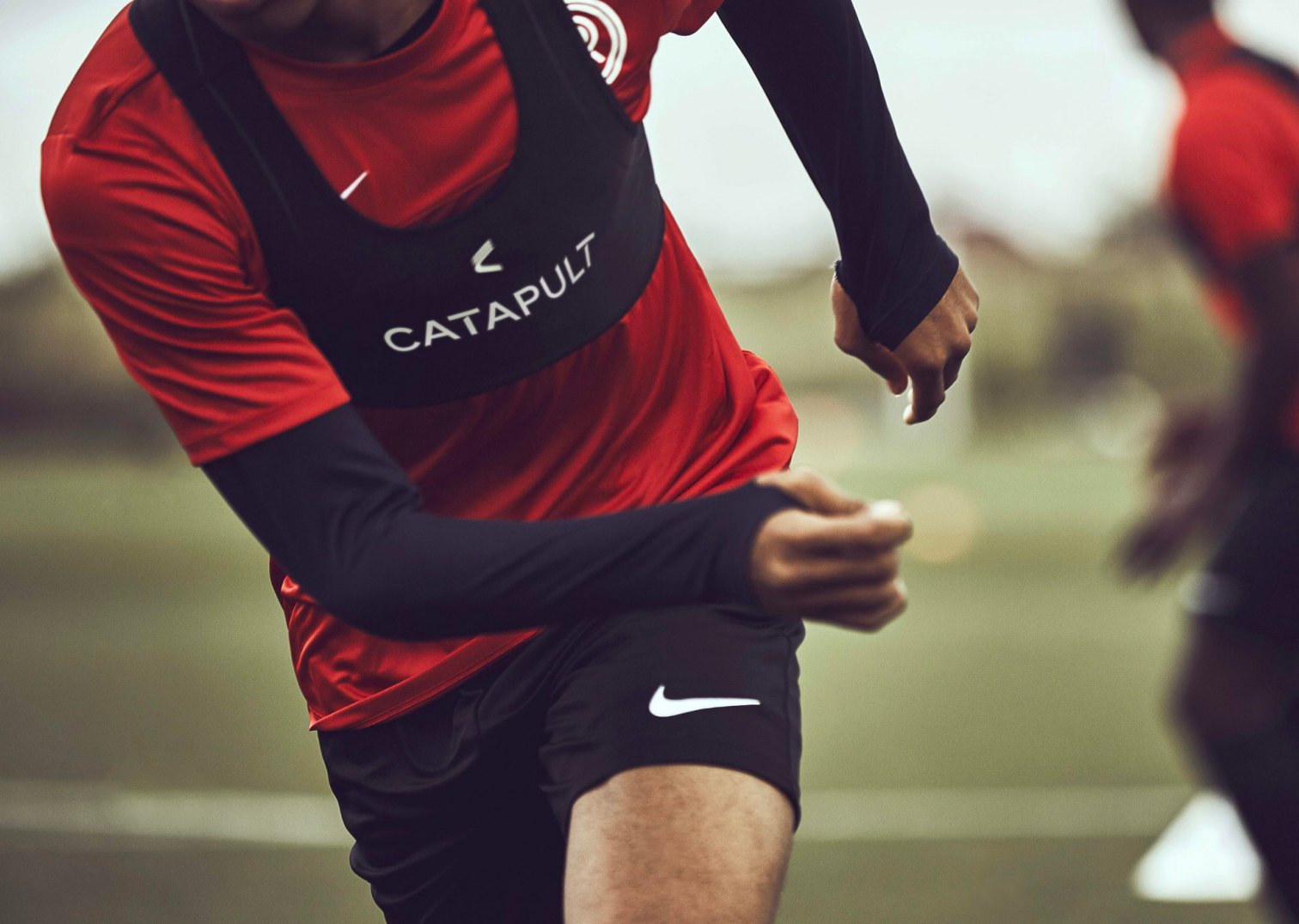 Player in training wearing a Catapult tracking vest