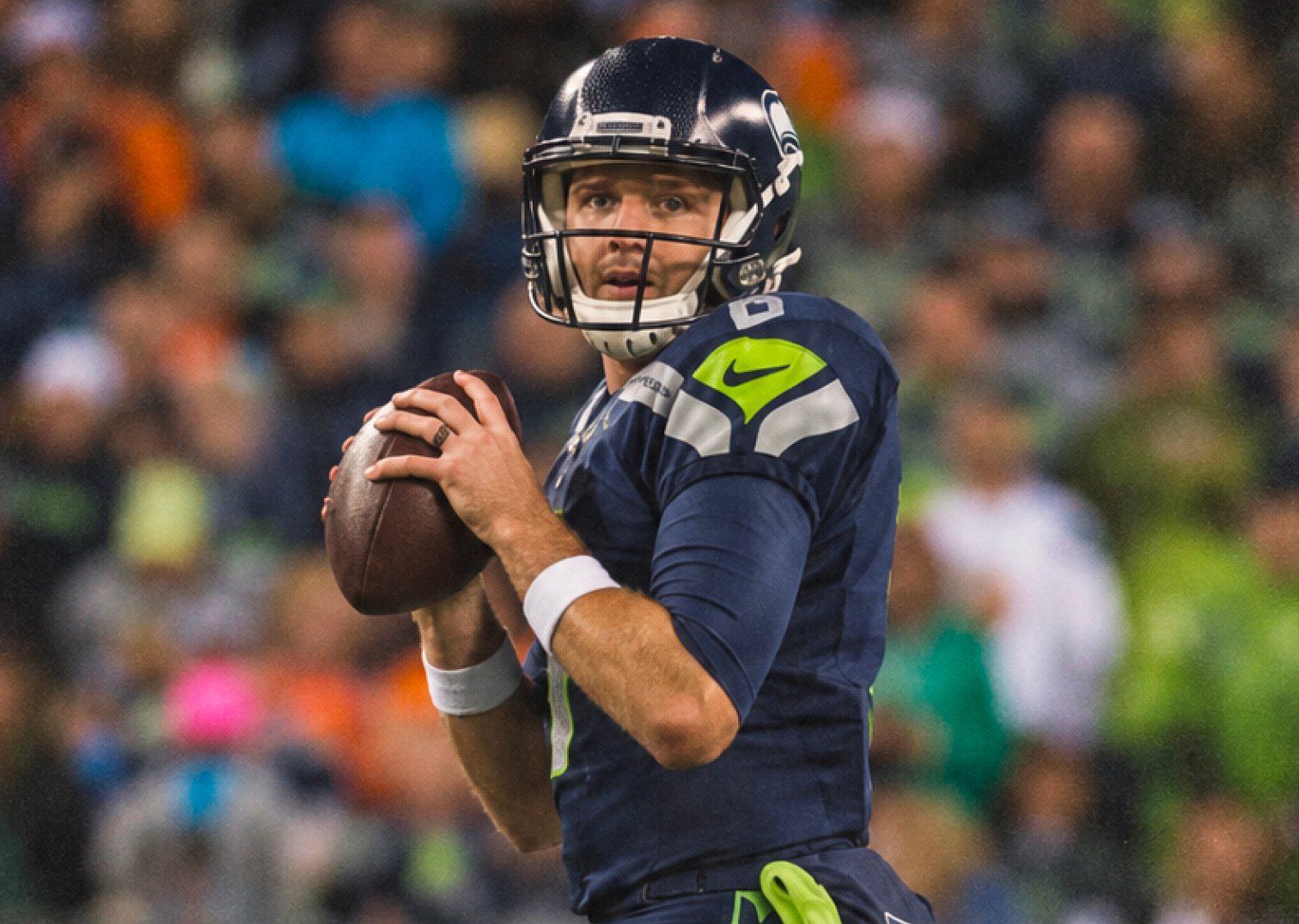 R.J. Archer in a Seattle Seahawks uniform dropping back to pass