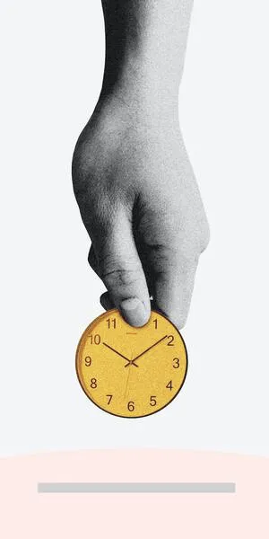 hand holding clock
