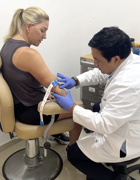 doctor giving healhth treatment to a woman
