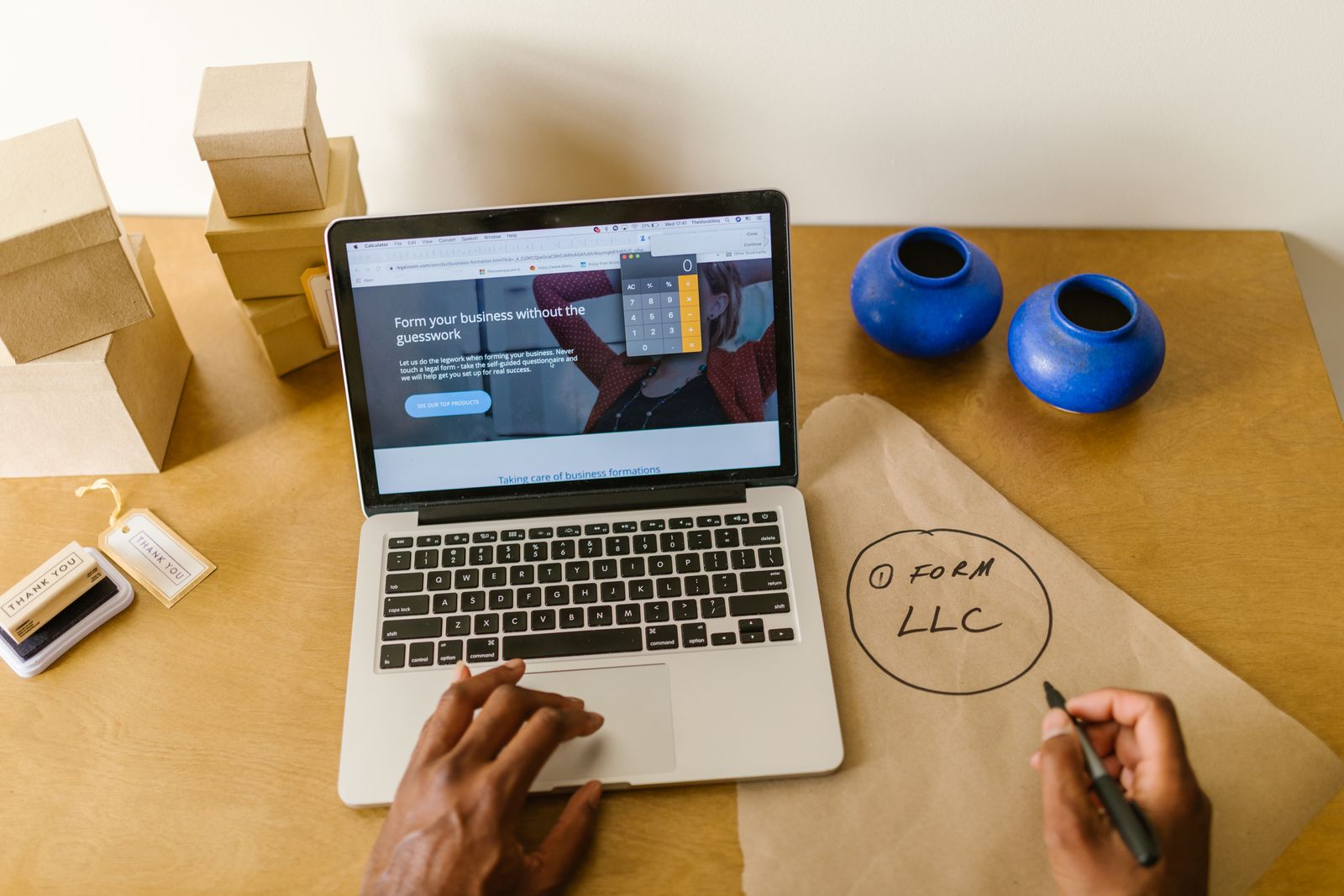 Person working on an ecommerce business from a laptop