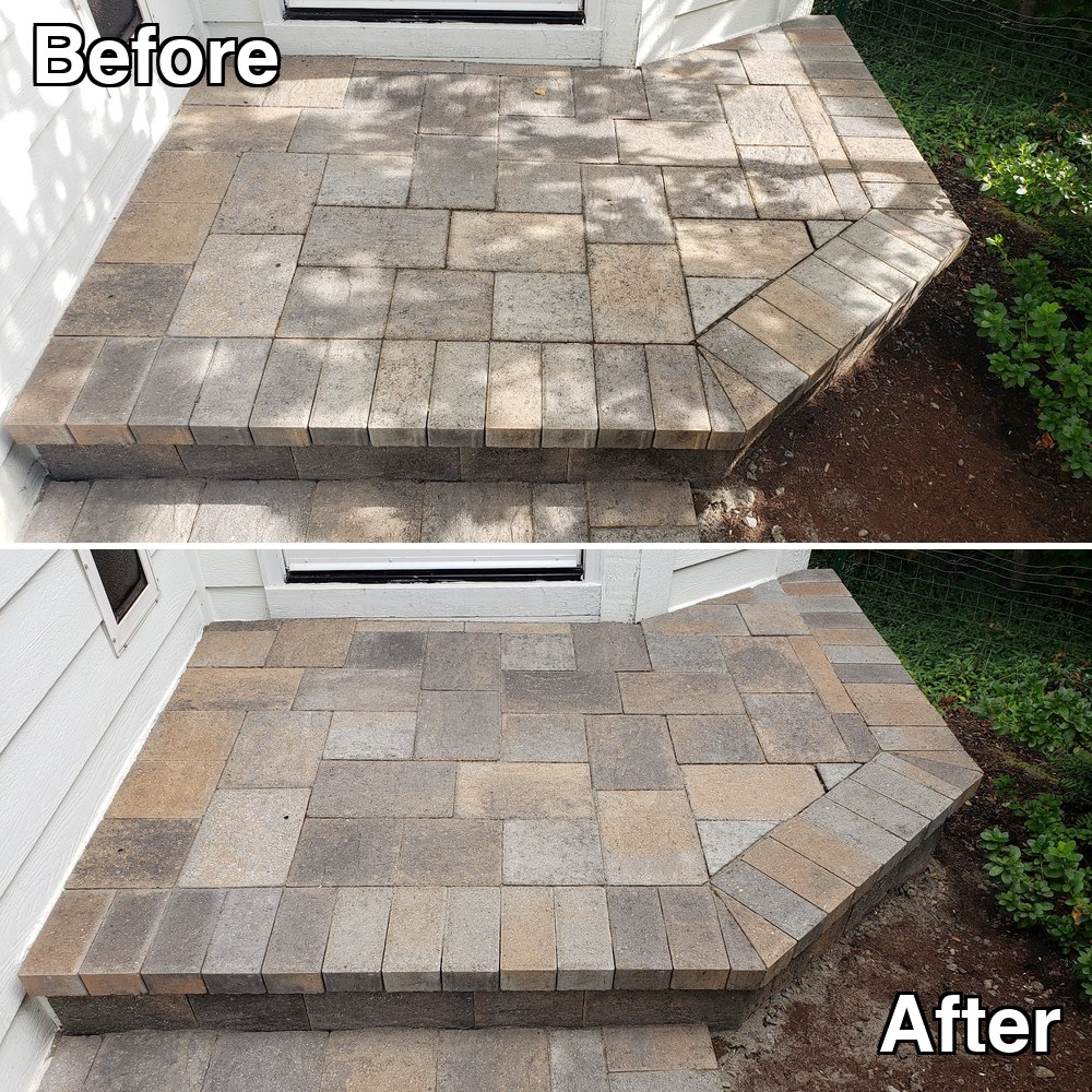 Before and after: a paver entry step and landing, dulled and soiled, cleaned to bright multi-tone stone